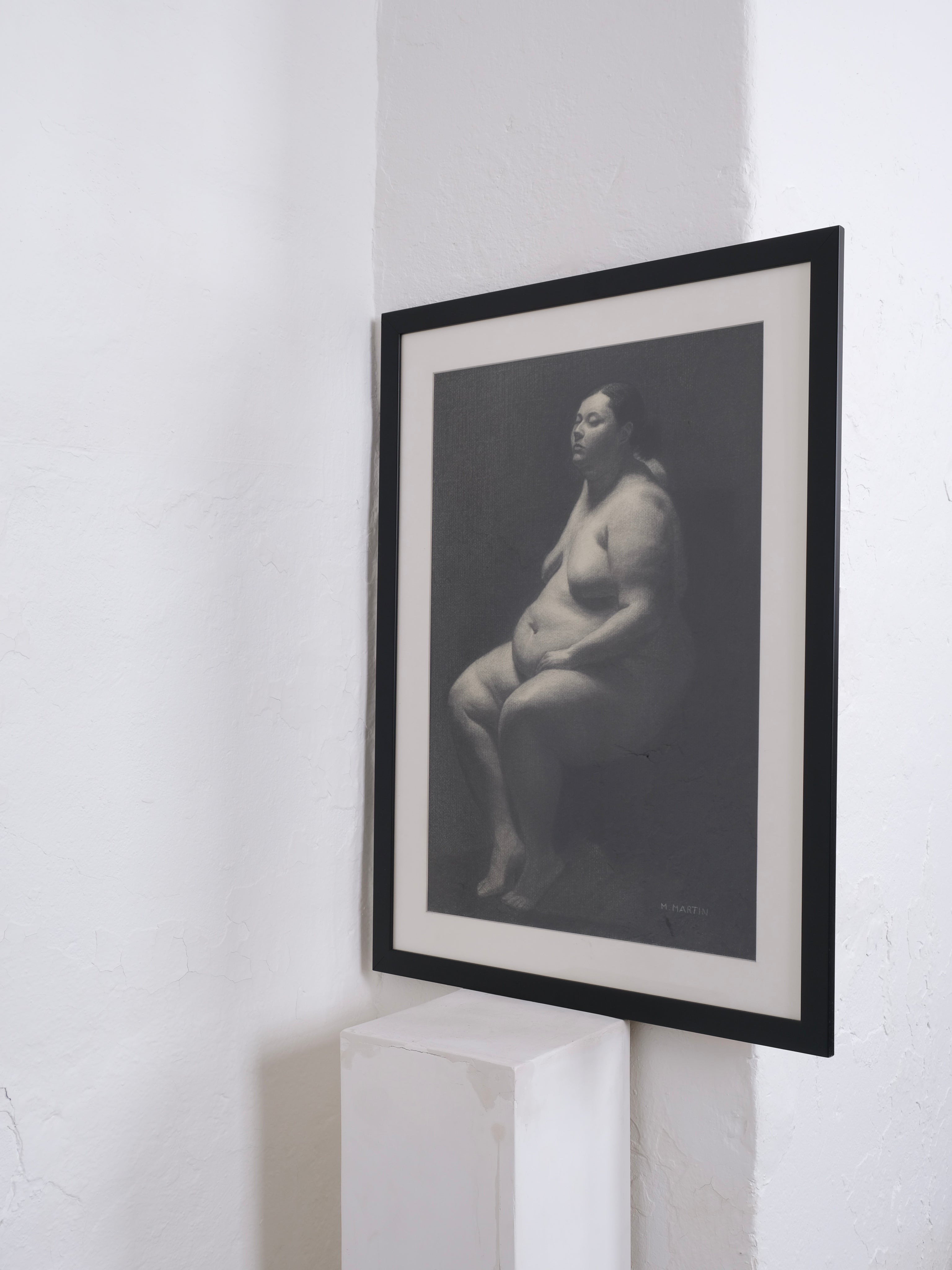 Mabel Martín Academic Nude Charcoal Drawing — framed on white wall in minimalist setting