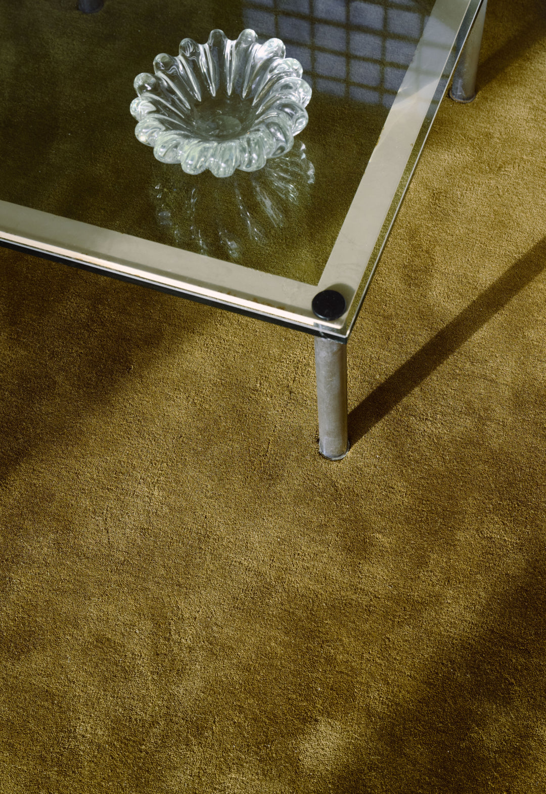 'Solid Wool' Handwoven Rug, Green Umber — side angle