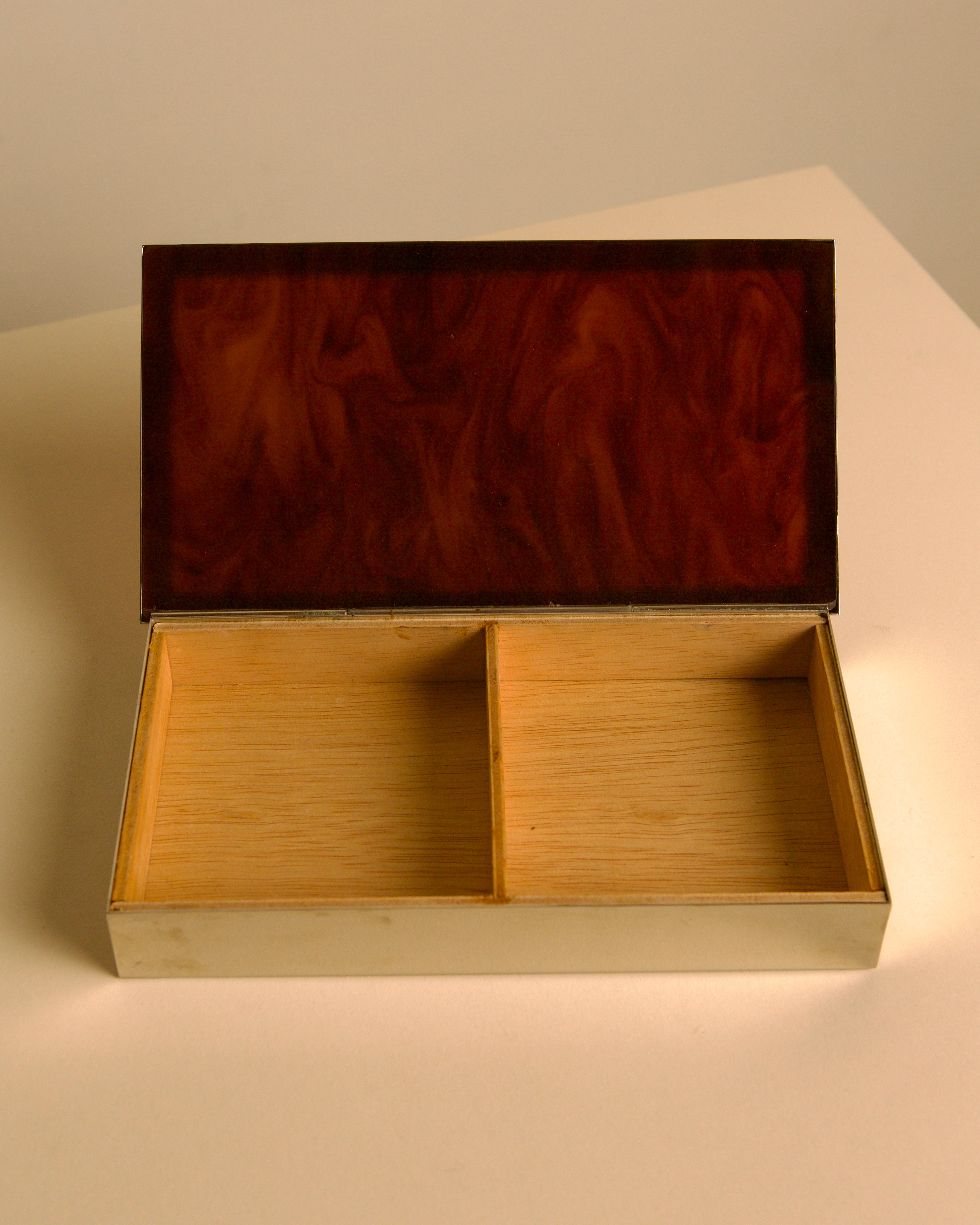 Italian rectangular box in chrome metal and faux tortoiseshell lacquer with light wood int — in context