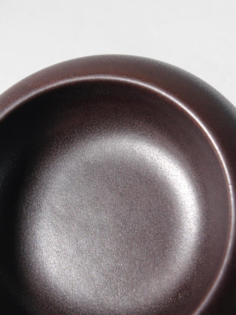 Andersson & Johanssons Brown Stoneware Bowl — close-up of dark brown glaze finish