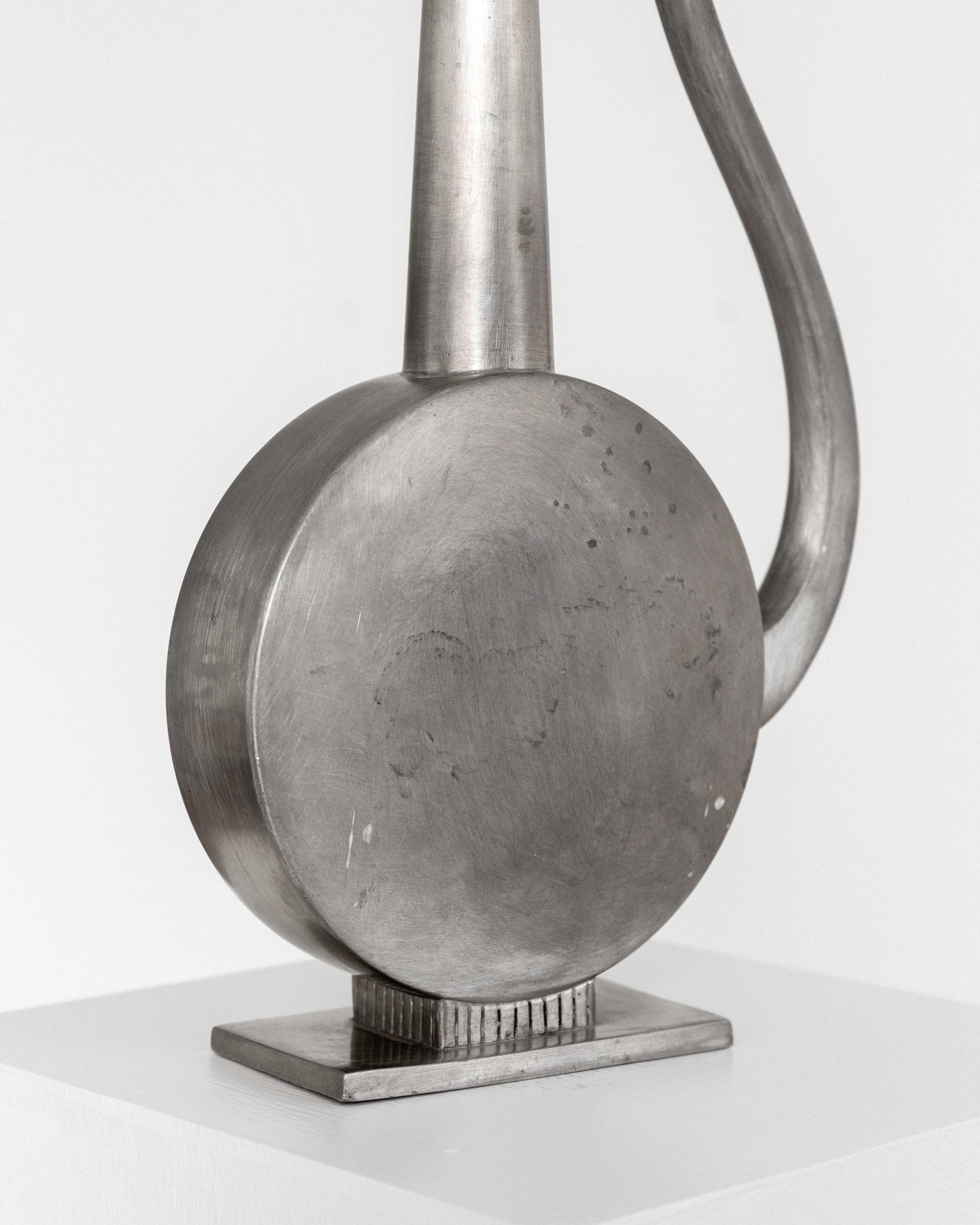 Sculptural Art Deco Pewter Pitcher by GAB, Sweden, 1930s — back view highlighting round base and smooth surface