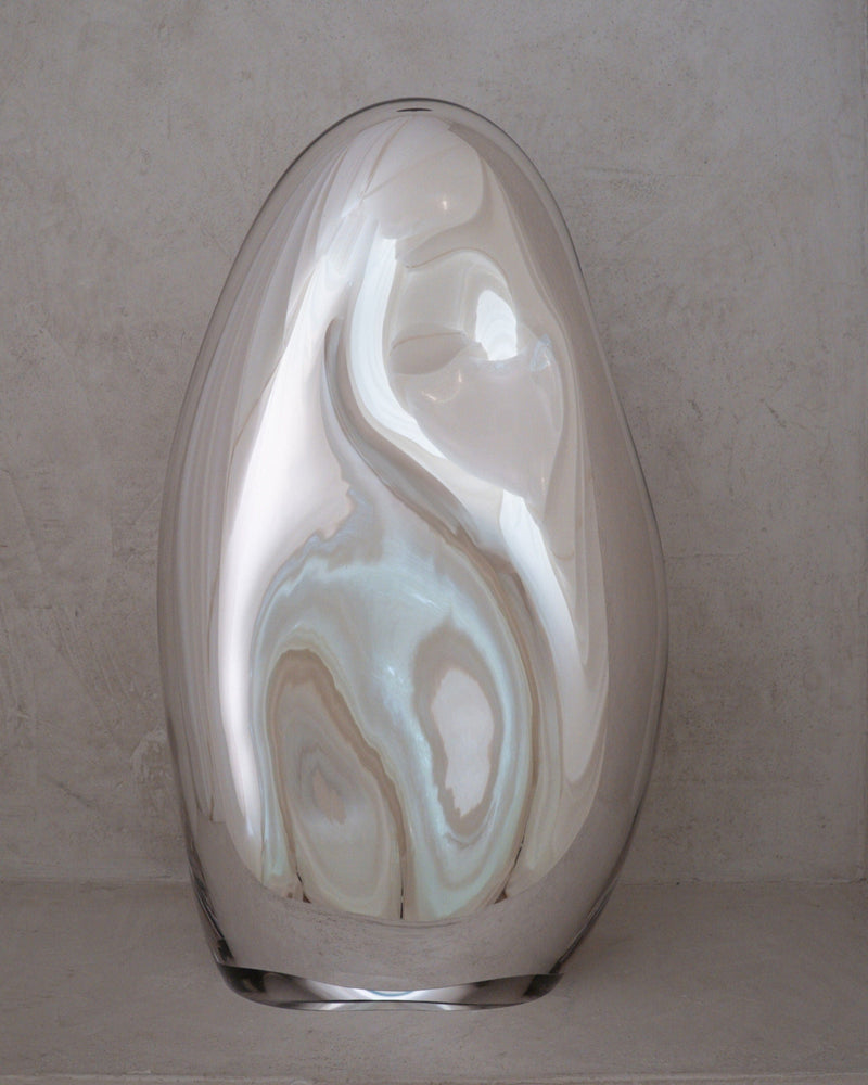 Standing Glass Sculpture - Contemporary Mirror Collection — close-up of reflective glass surface