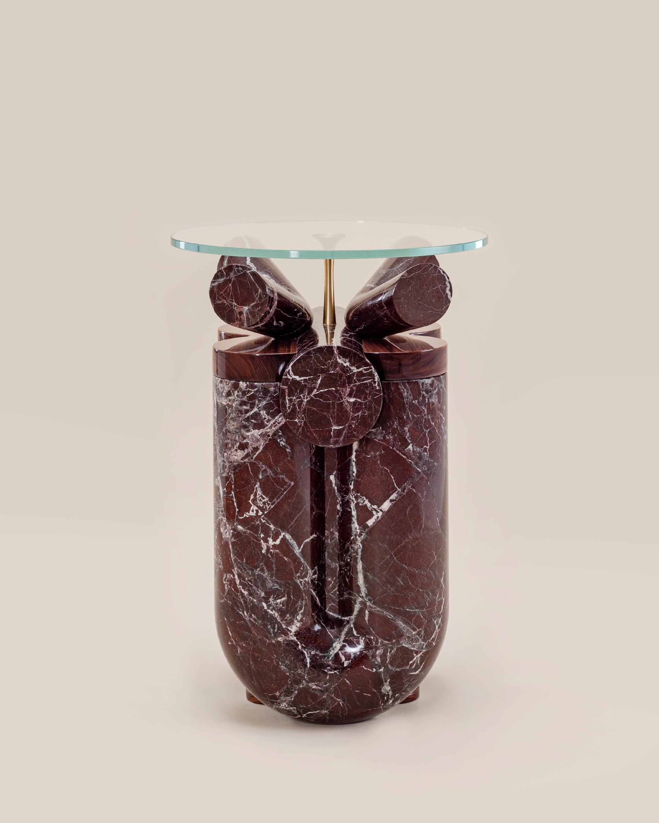 Ceti Side table — front view of red marble base with glass top