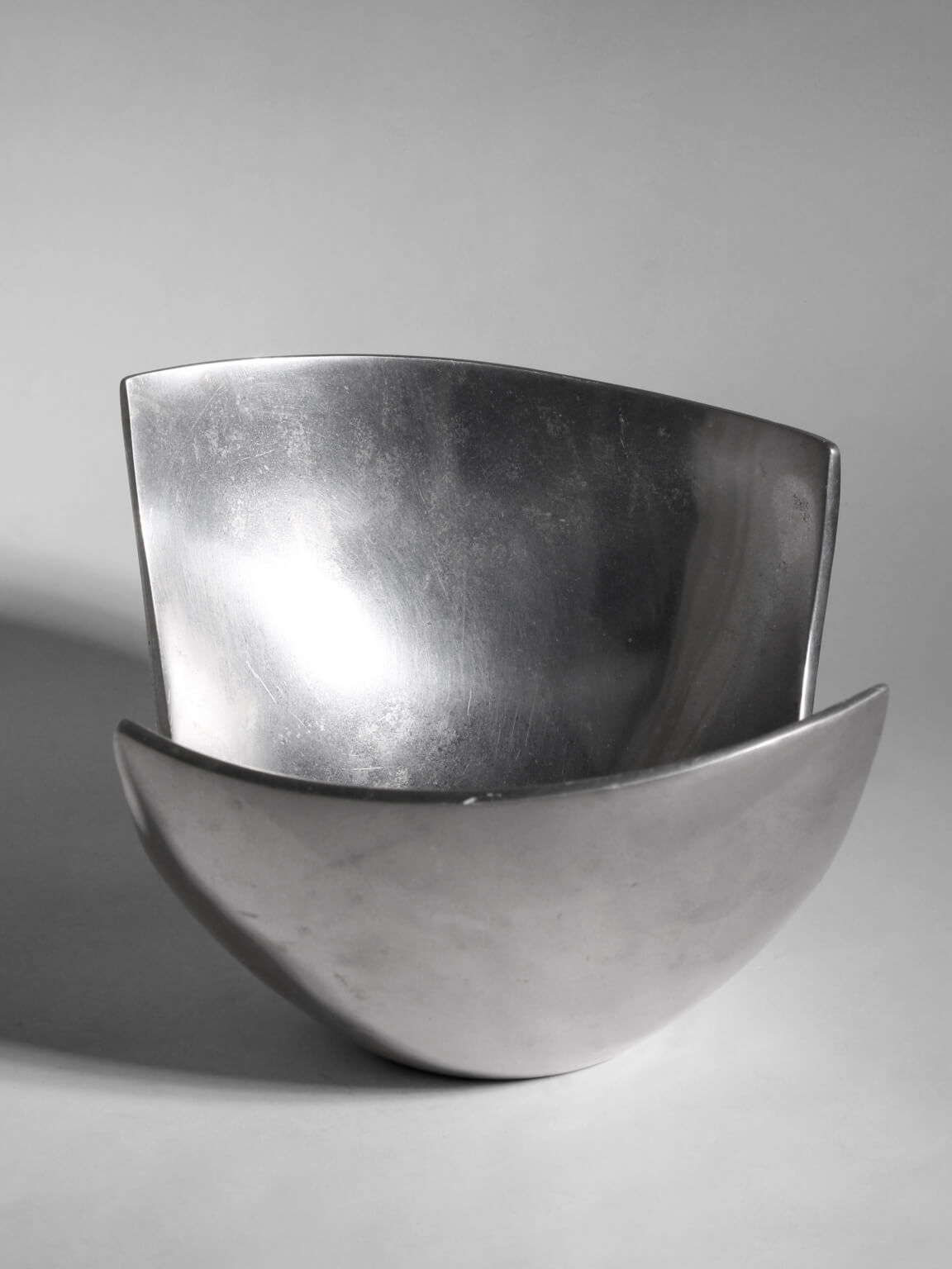 Polished Aluminum Asymmetric Contemporary Deep Bowl, Medium — side angle