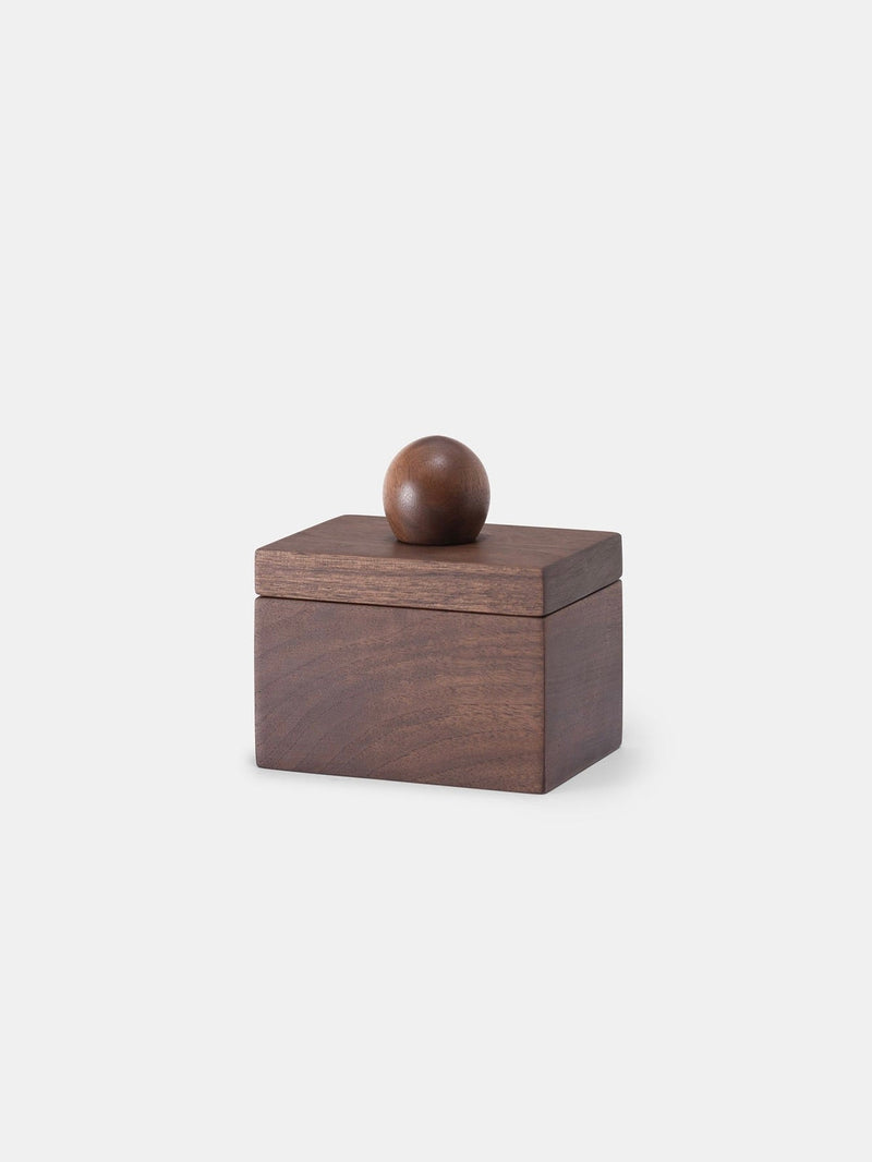 Box 01 Walnut — close-up of handcrafted walnut box with round lid