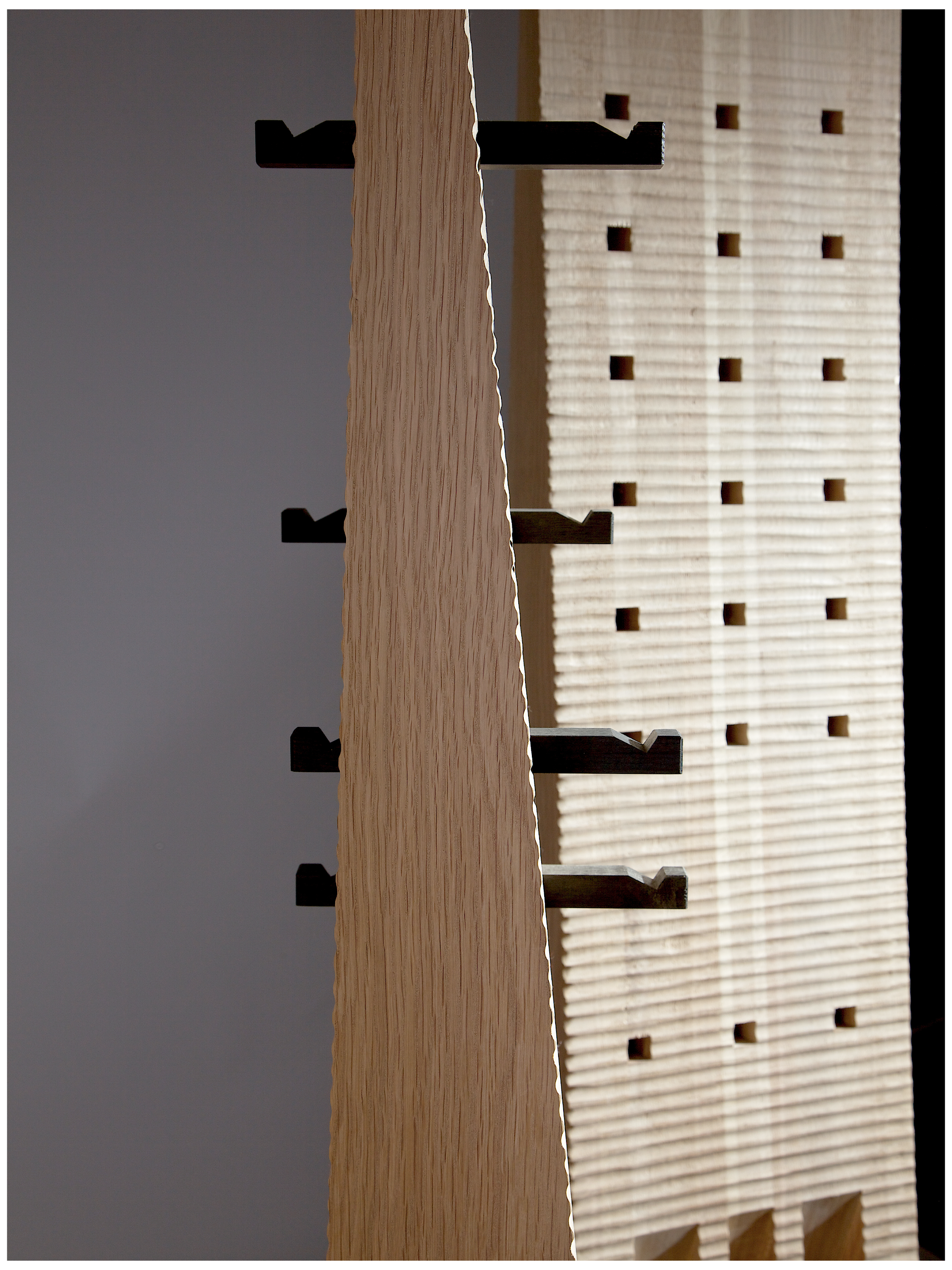 Totem Coat Stand - Oak and 5500 years old Bog Oak — side angle showing wooden structure and hooks