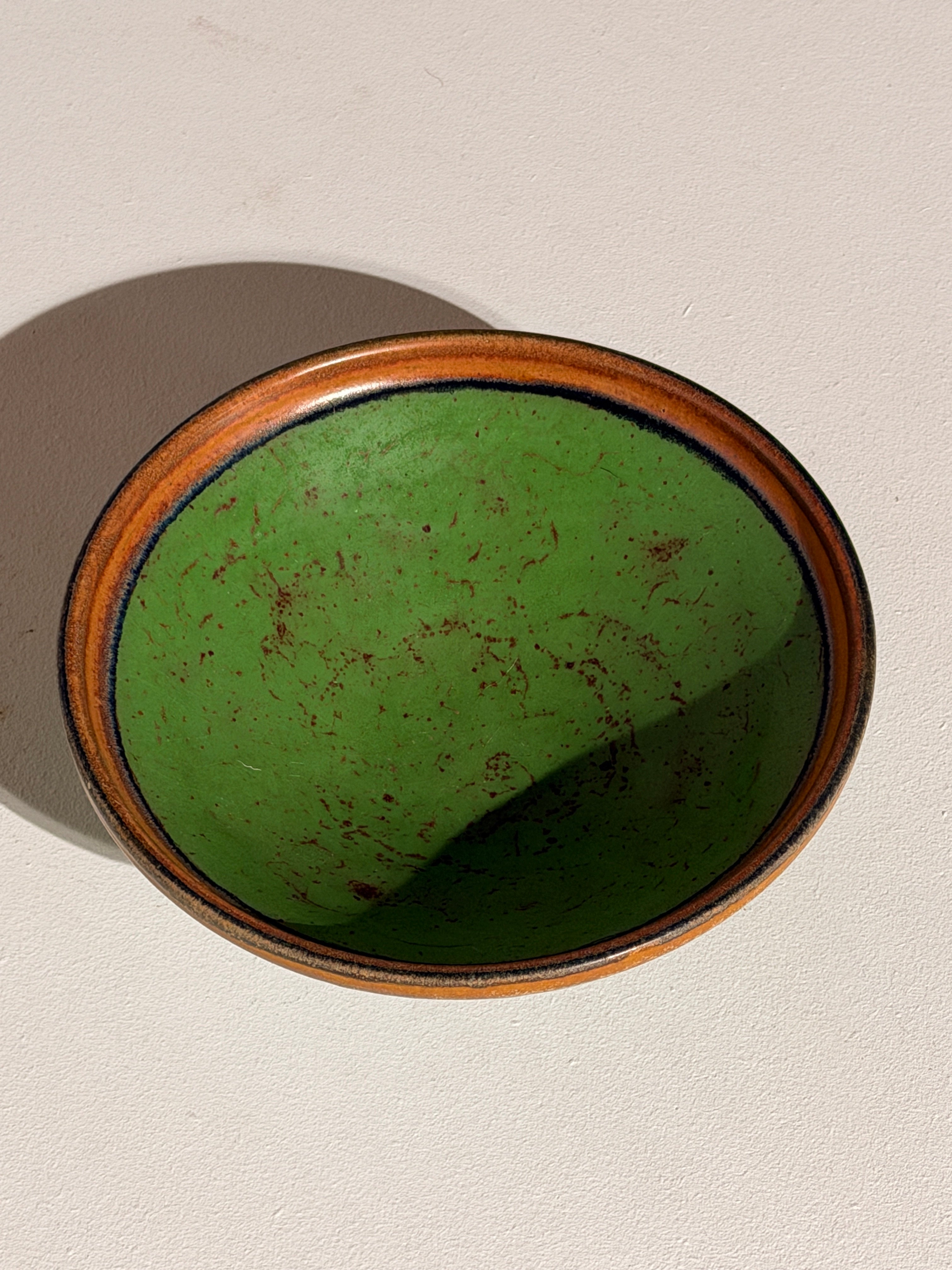 Ceramic Bowl by Louis Lorioux, France, circa 1930 — side angle showing green interior and brown rim
