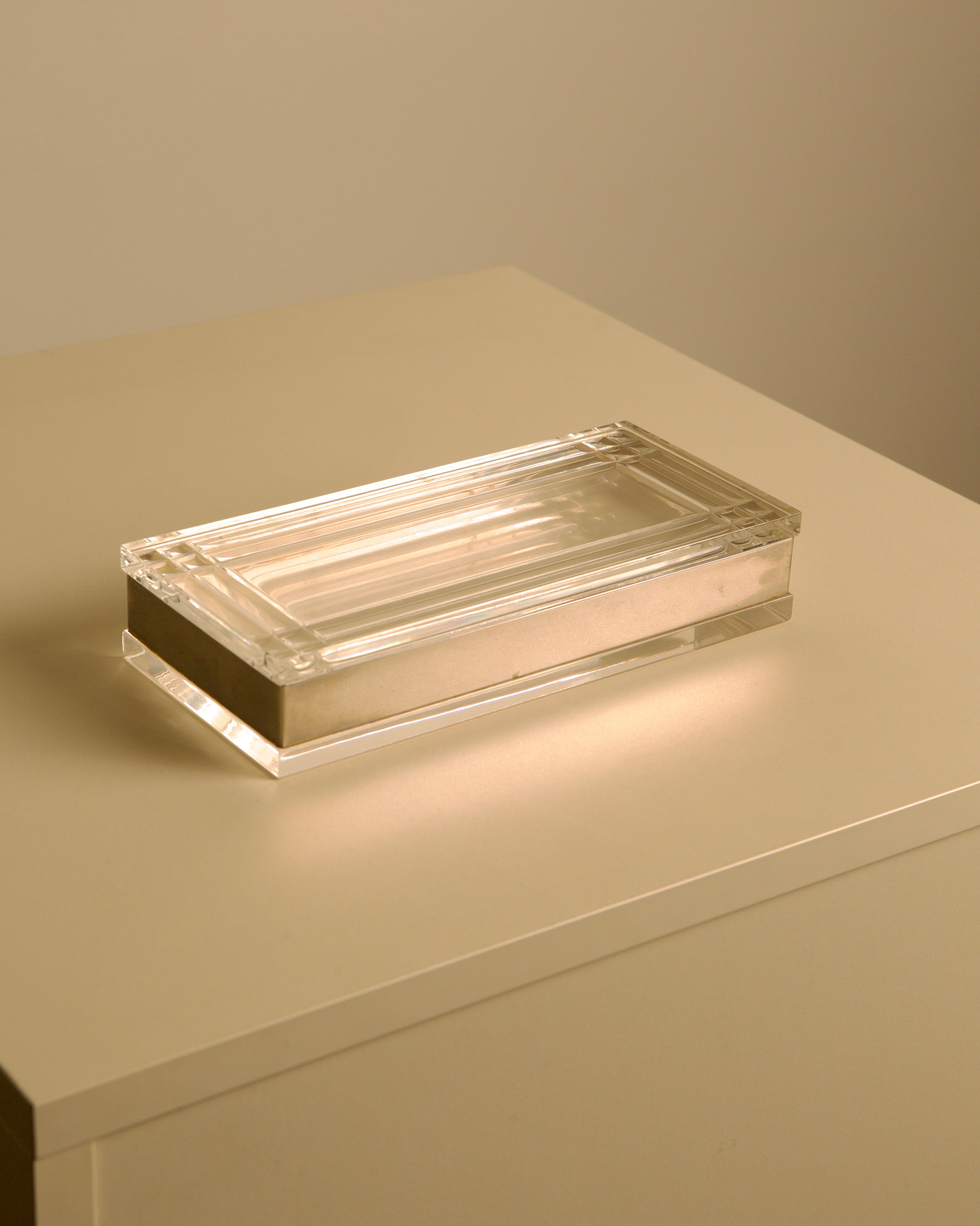 Large Rectangular Italian Silver and Plexiglass Box 70s — top view on light-colored surface