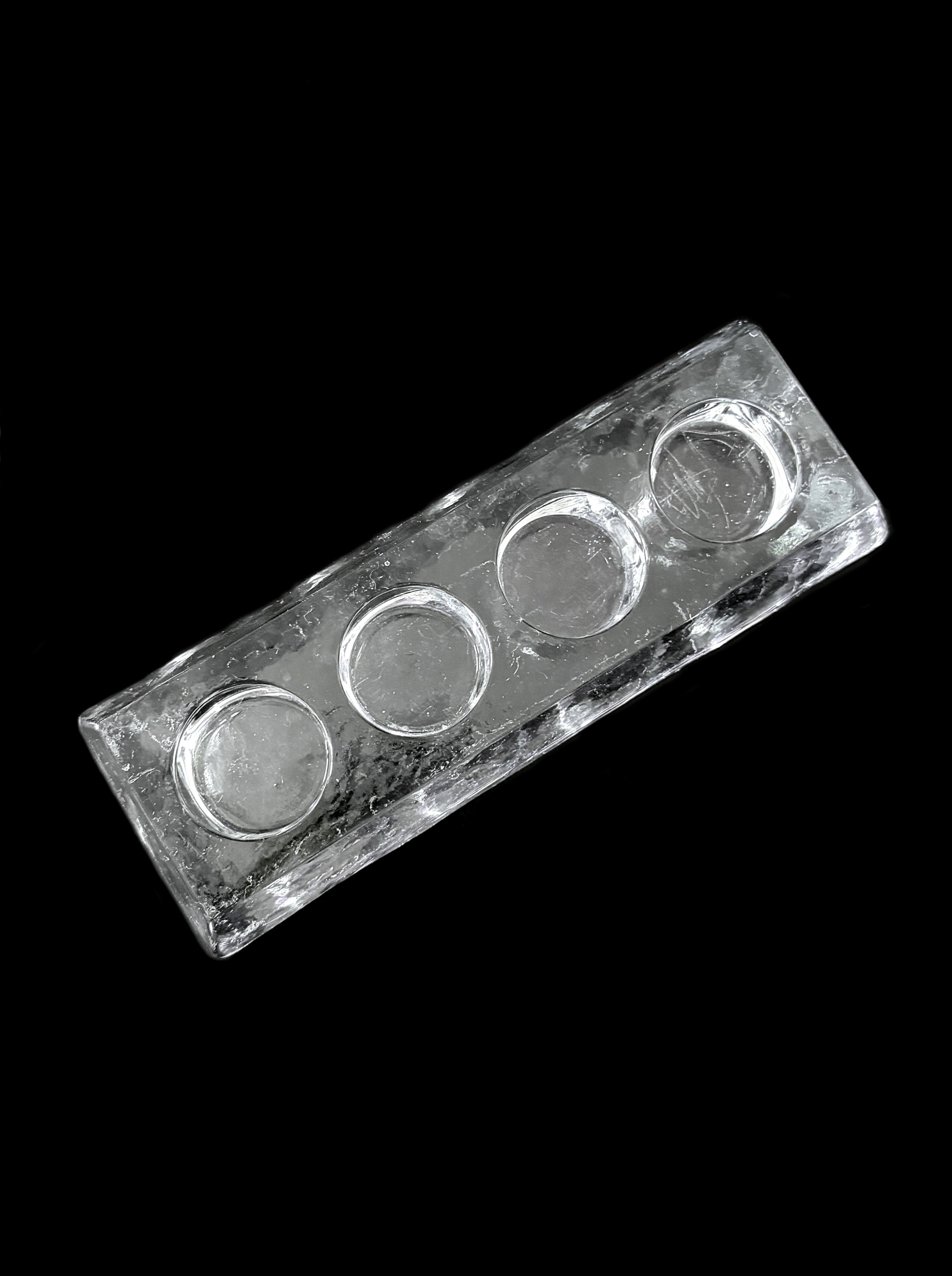 Glass candle holder — detail view