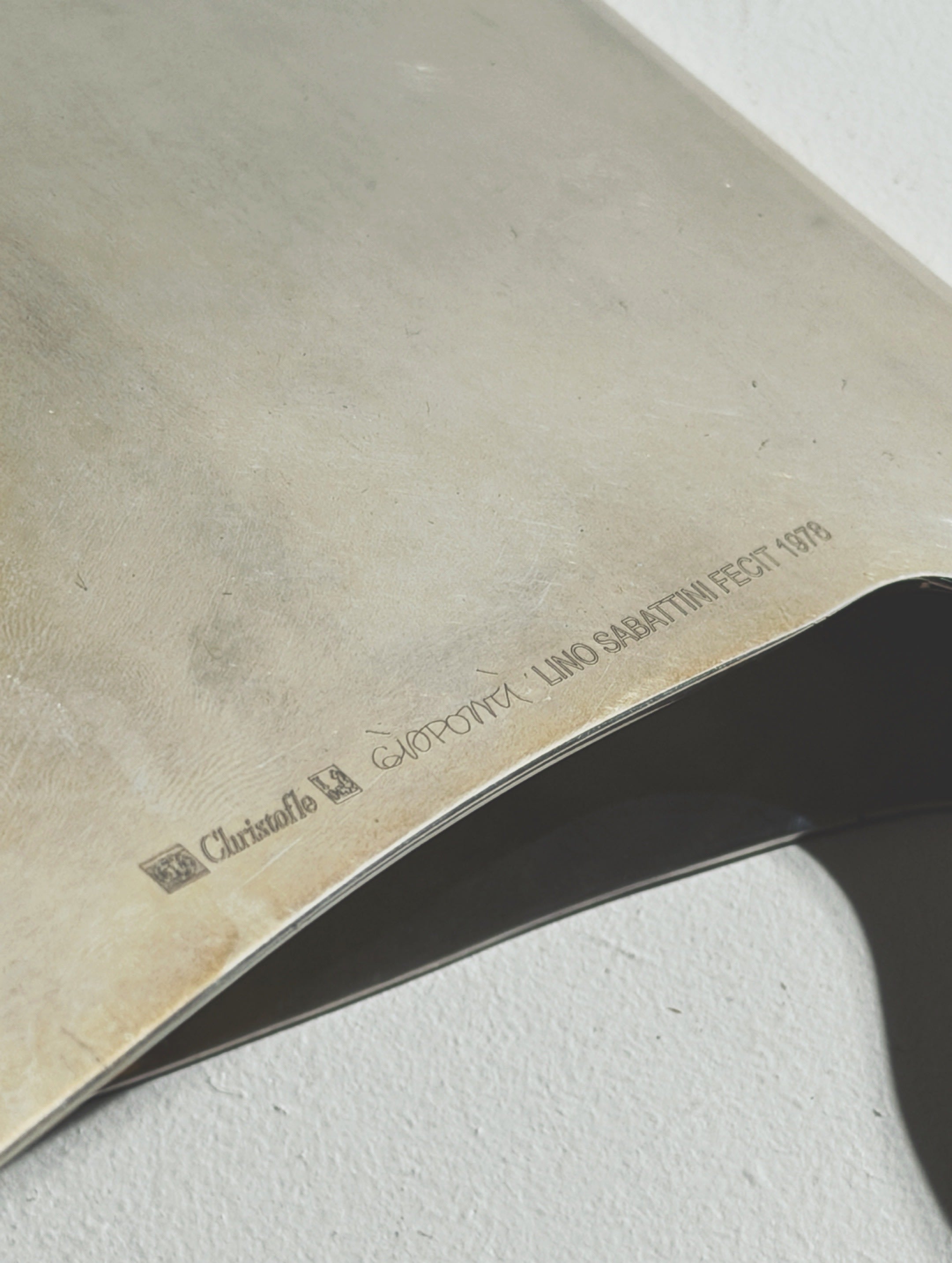 Large Sculpture ‘Il Cavallo Grande’ by Gio Ponti for Christofle, 1978. — close-up of brushed metal surface with signature