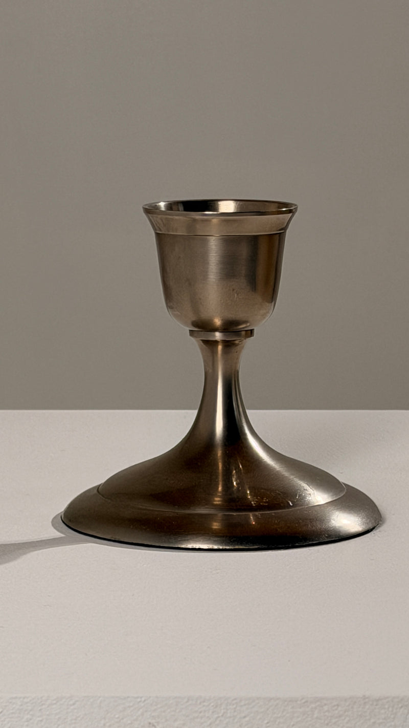 Silver-plated Metal Candleholders, France, circa 1930 — close-up of polished metal surface