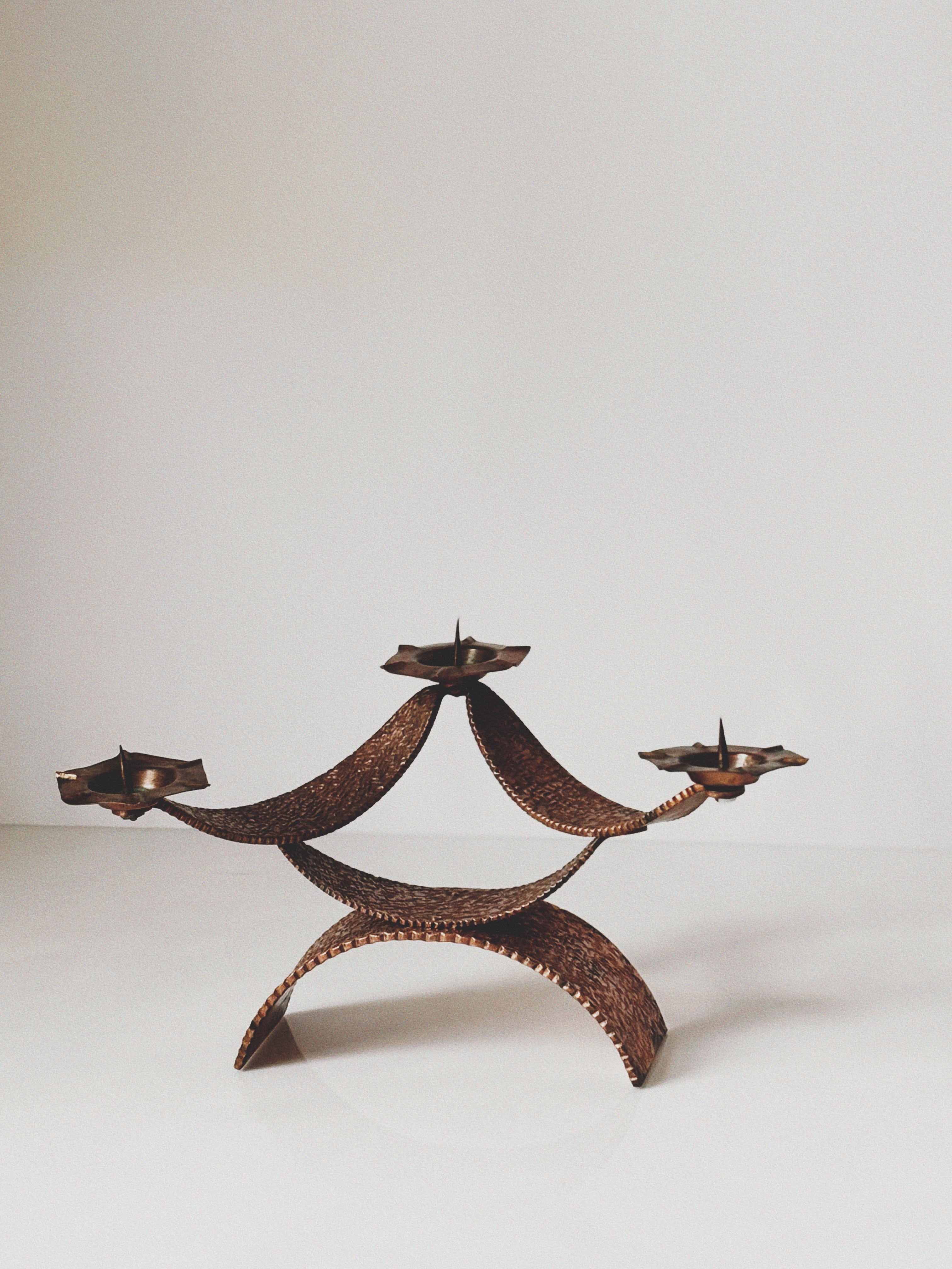Mid Century Hammered Metal Candlestick, Poland — close-up of textured metal design