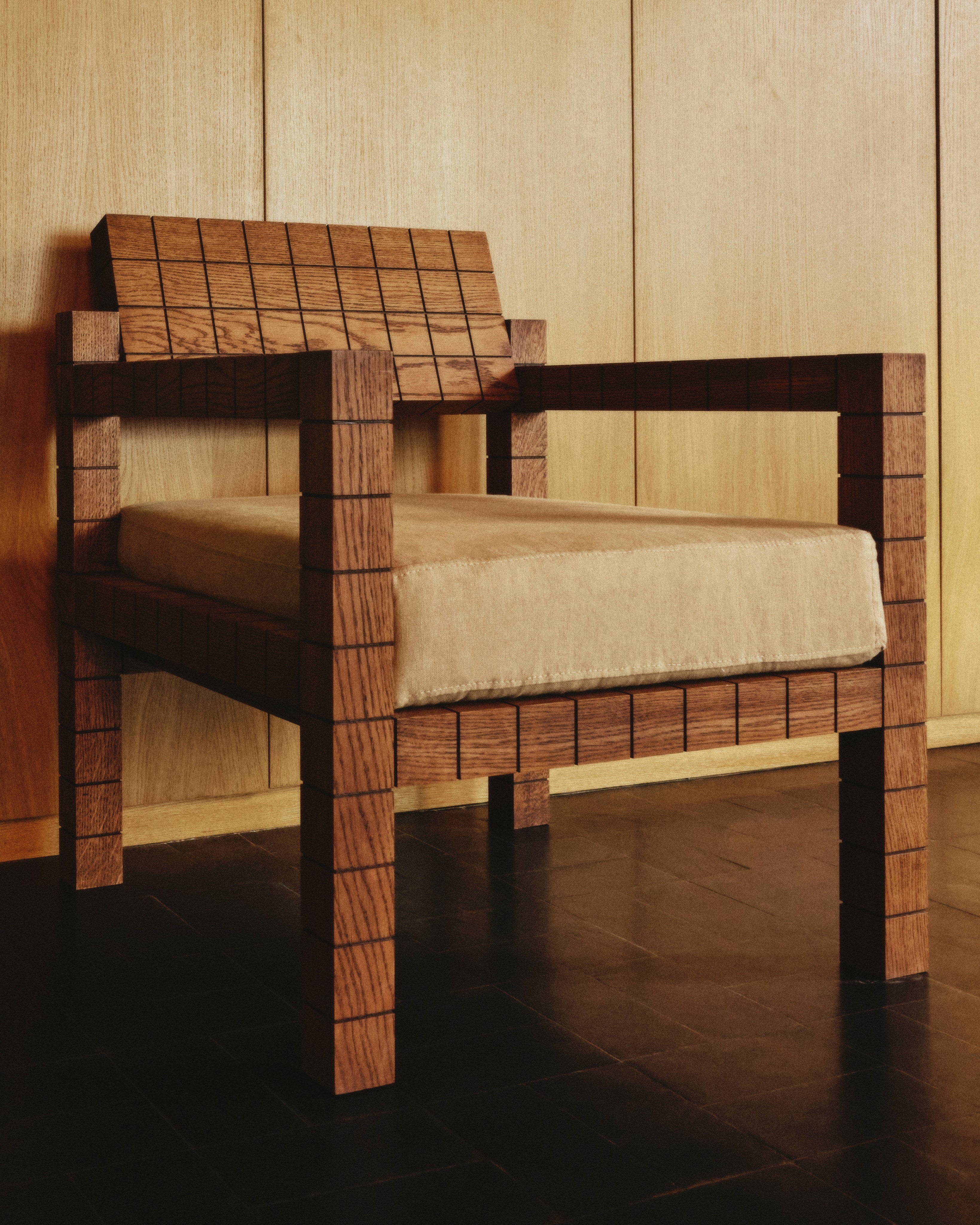 Mosaico Armchair — angled view highlighting wooden frame and cushion