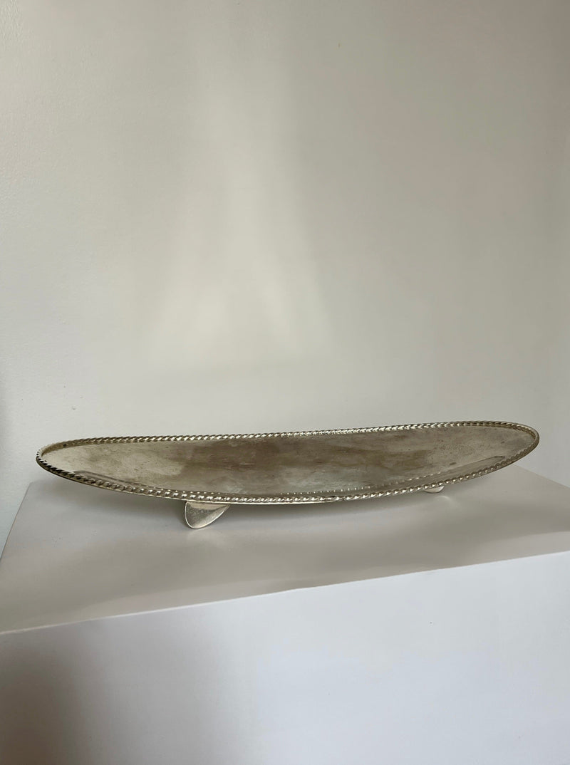 Elegant oval silver serving tray with decorative rope edge border