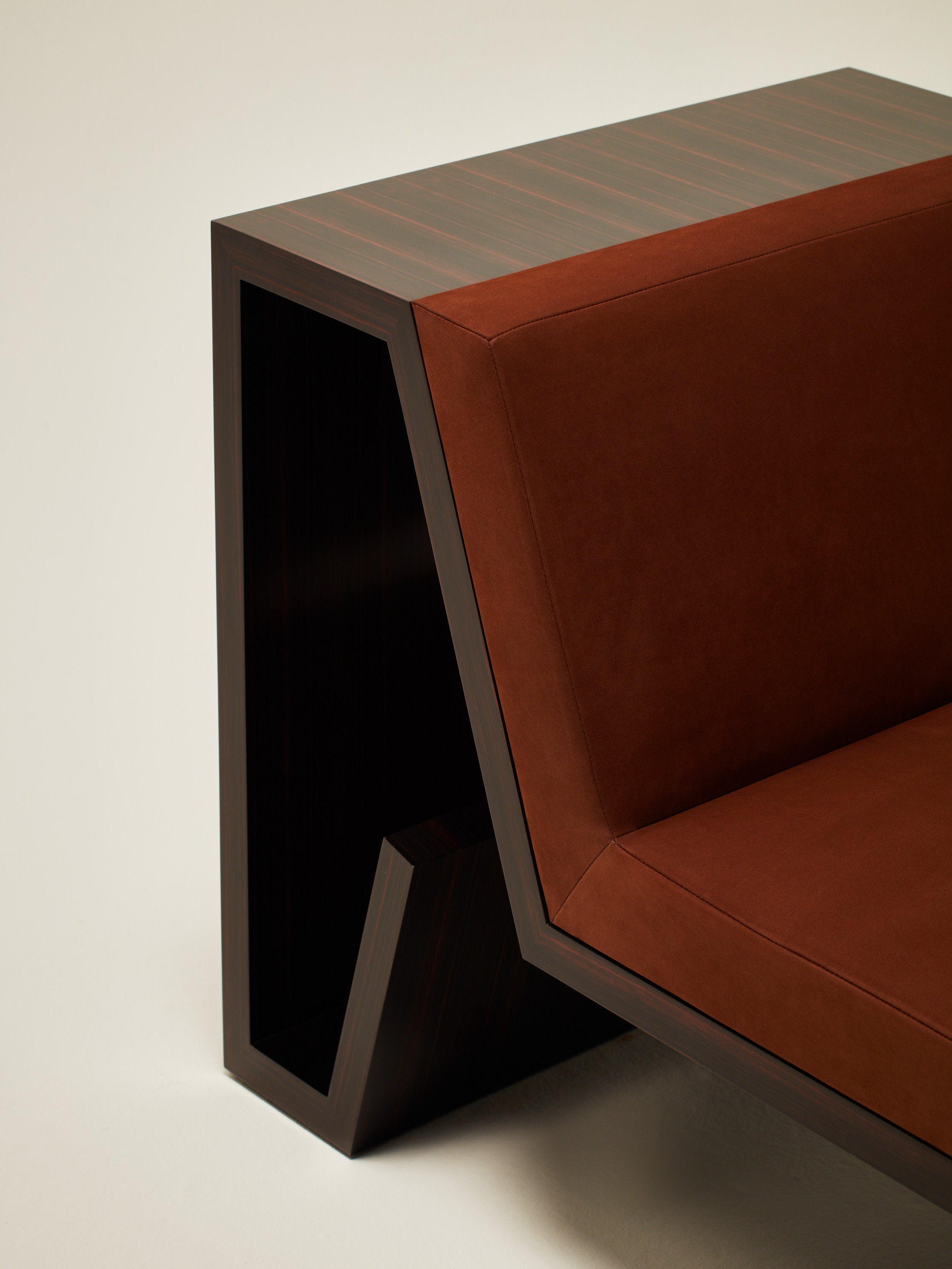 'Continuous' Lounge Chair Handcrafted in Wood Veneer & Leather Upholstery — side angle