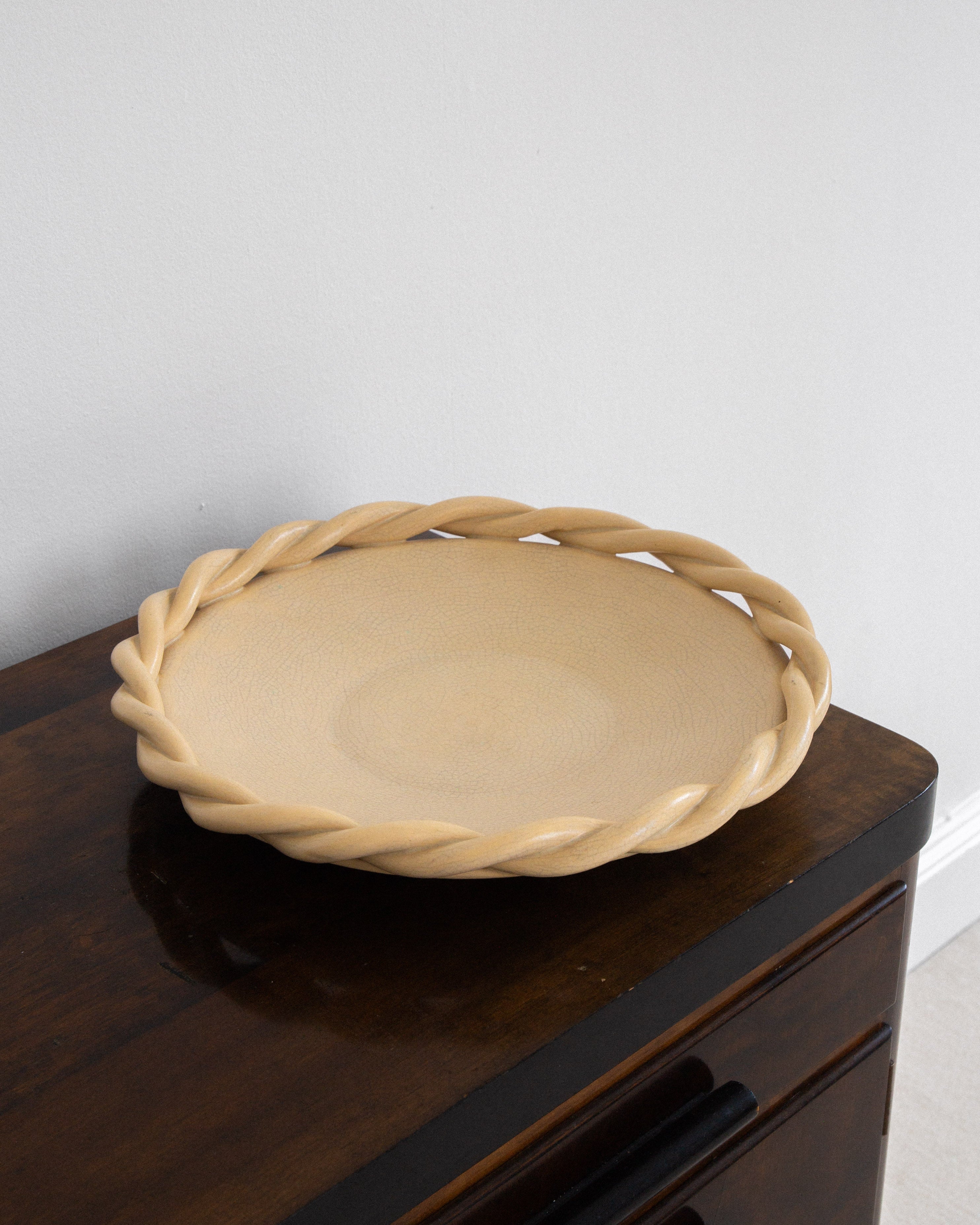 Large Decorative Ceramic Plate by Eva-Jancke Björk, 1940s, Sweden — overhead view on dark wooden surface