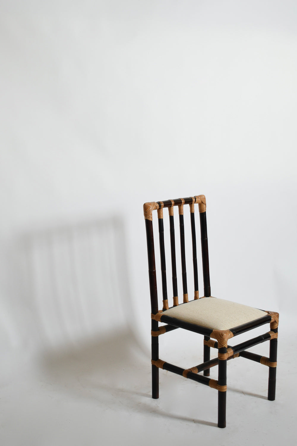 Set of four bicolor rattan chairs, 1970s — side angle
