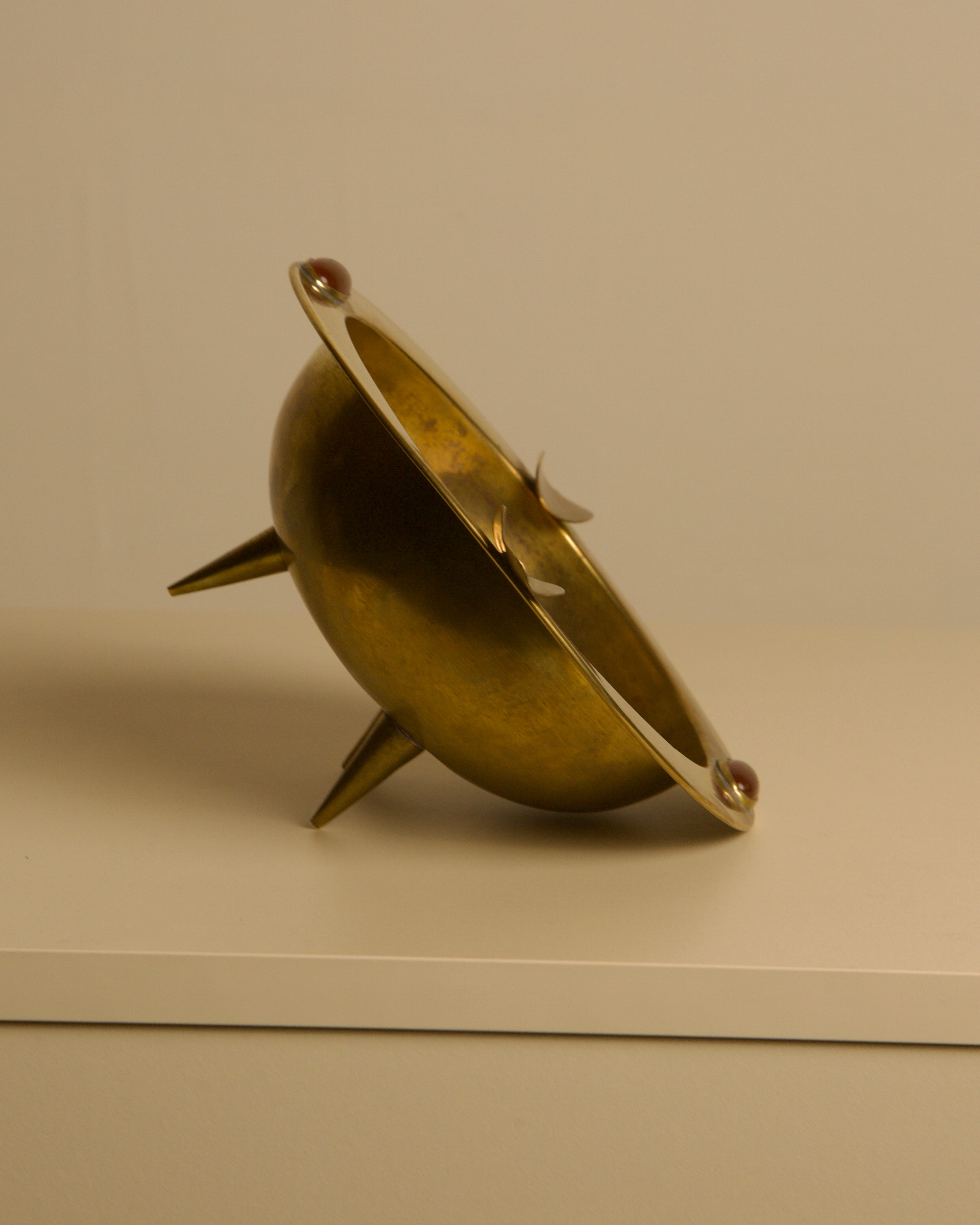 Large Italian Art Deco Brass Ashtray, 1930s — angled view on neutral background
