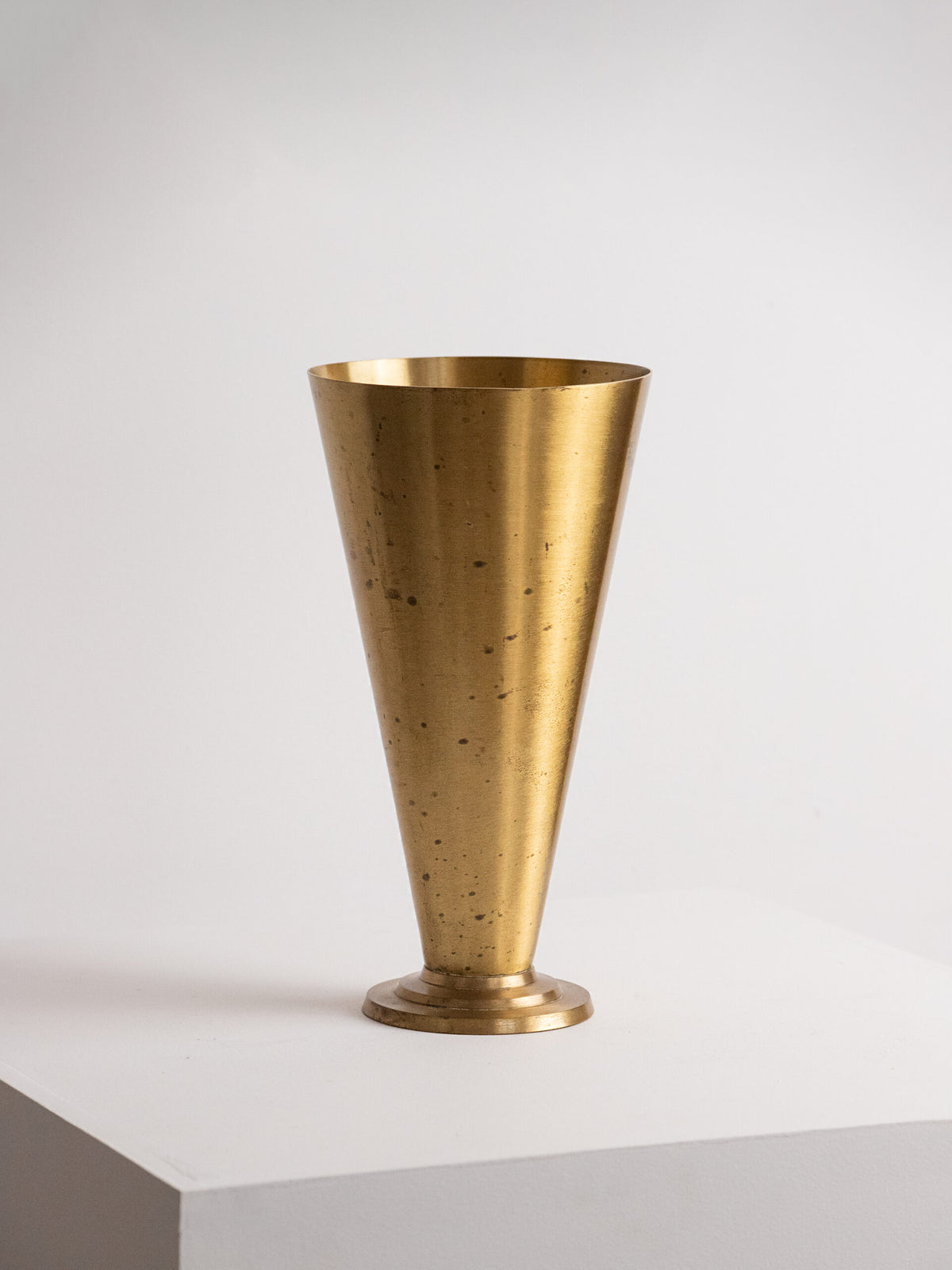 Art Deco Conical Brass Vase on Three-Step Ziggurat Foot, Continental Europe, circa 1930s — lifestyle setting
