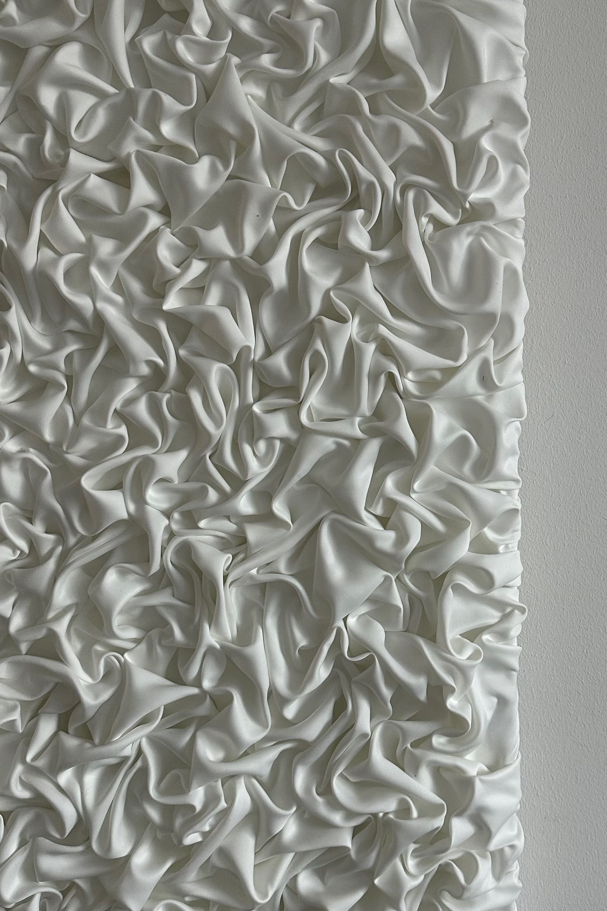 ESCAPISM 108' sculptural wall art — close-up of white textured fabric