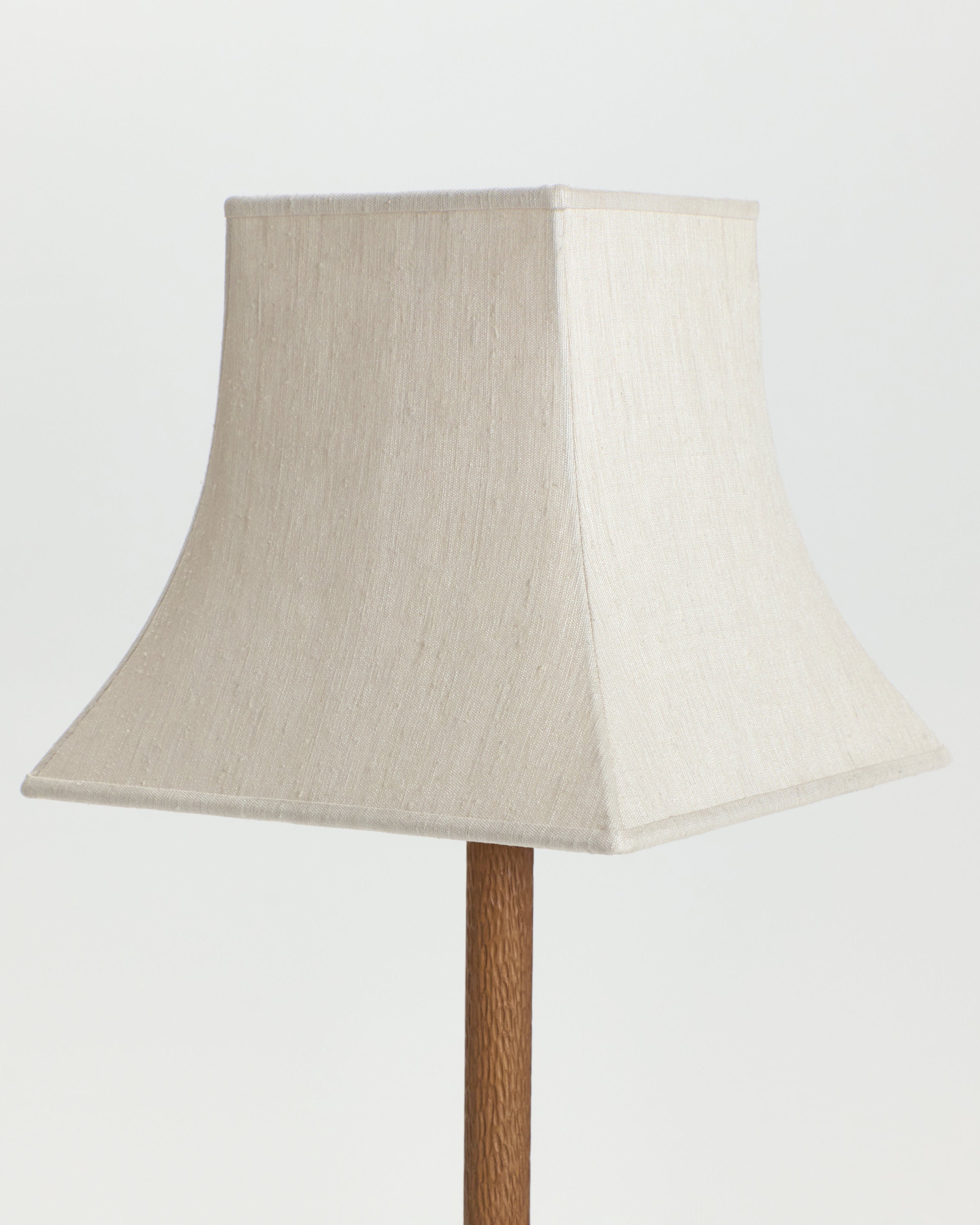 Coquette Floor Light — top view of linen shade and wooden base
