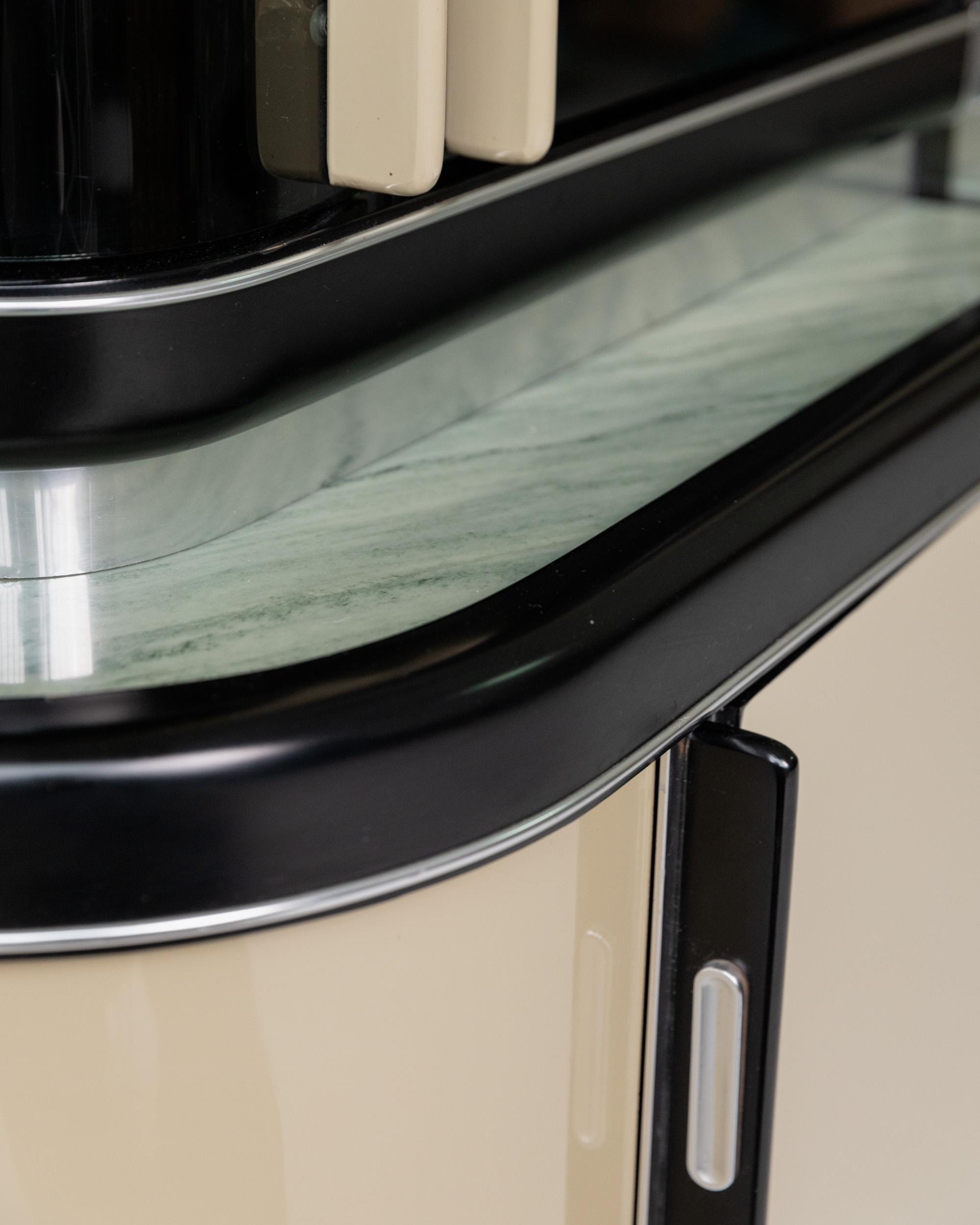 1950s Art Deco Bar Cabinet in Lacquered Wood — close-up of black and cream lacquered surface