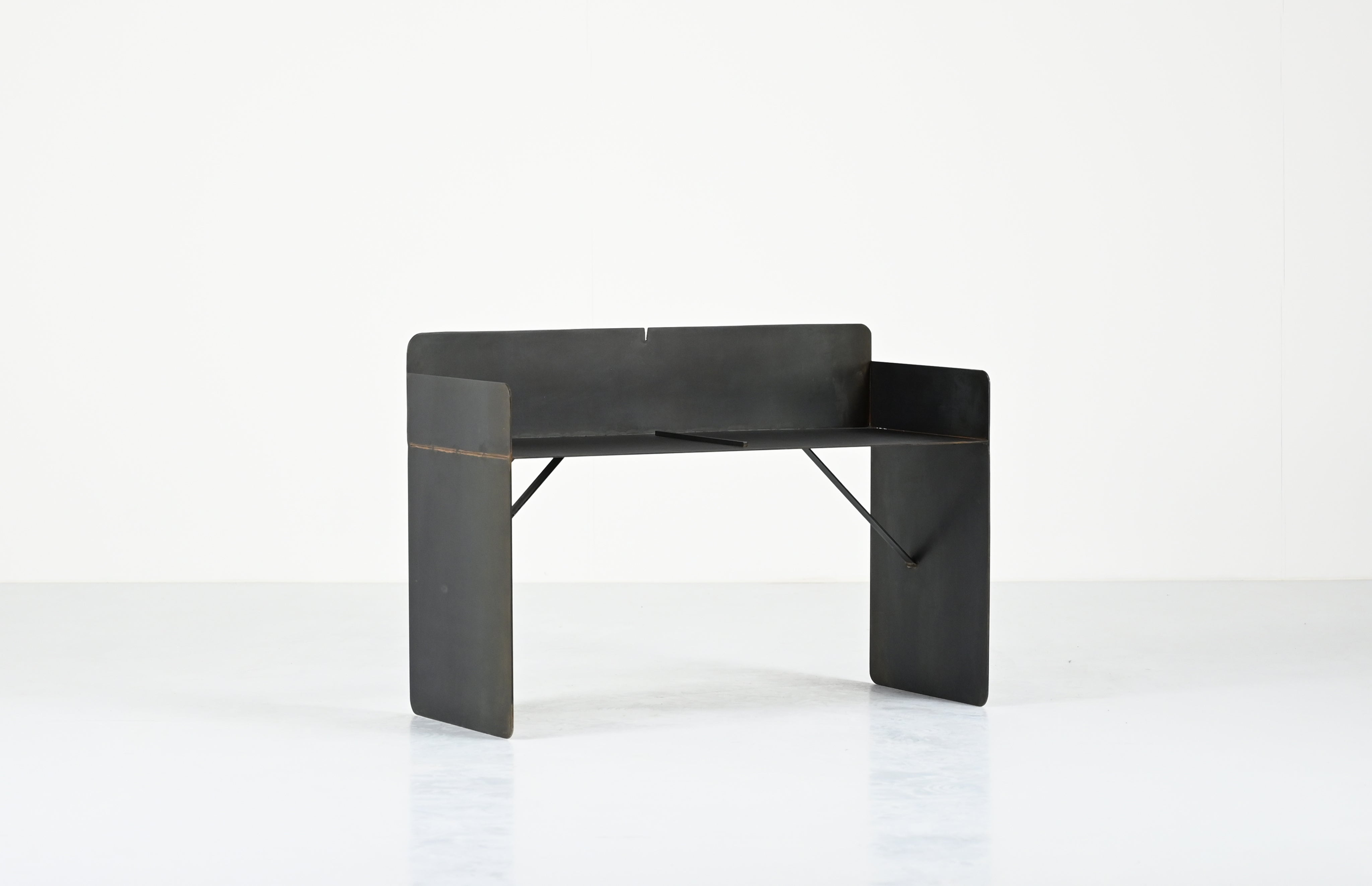 The Bench - Brutalist Bench in Steel — back view against white background