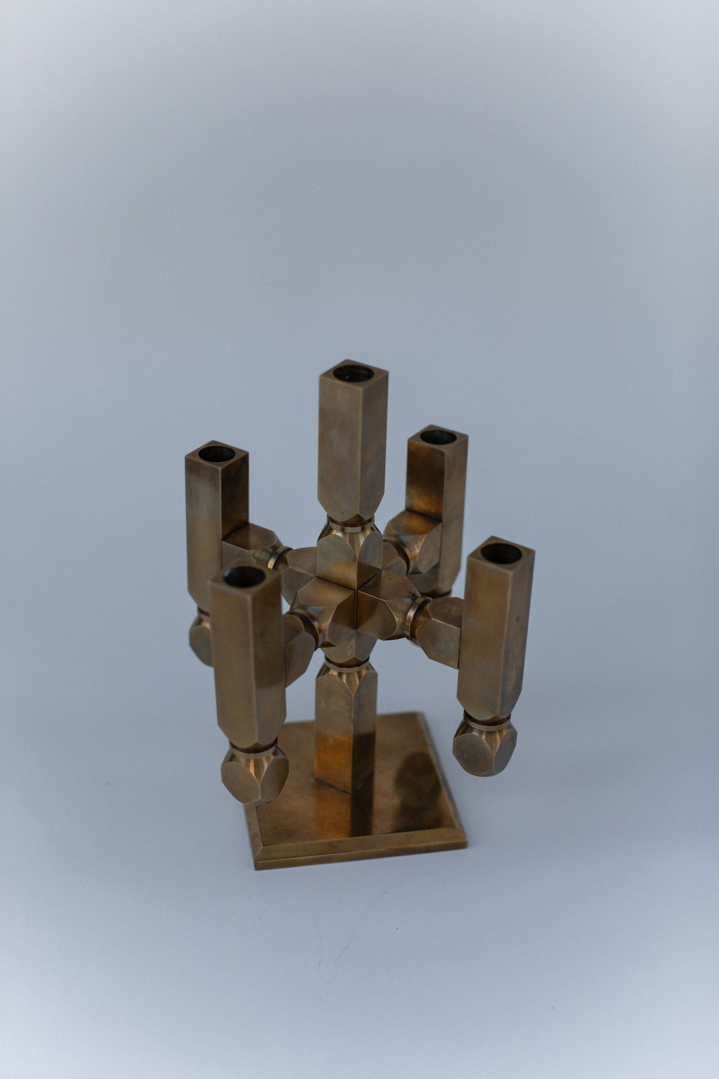 Brutalist brass candelabra with geometric tubes on square base