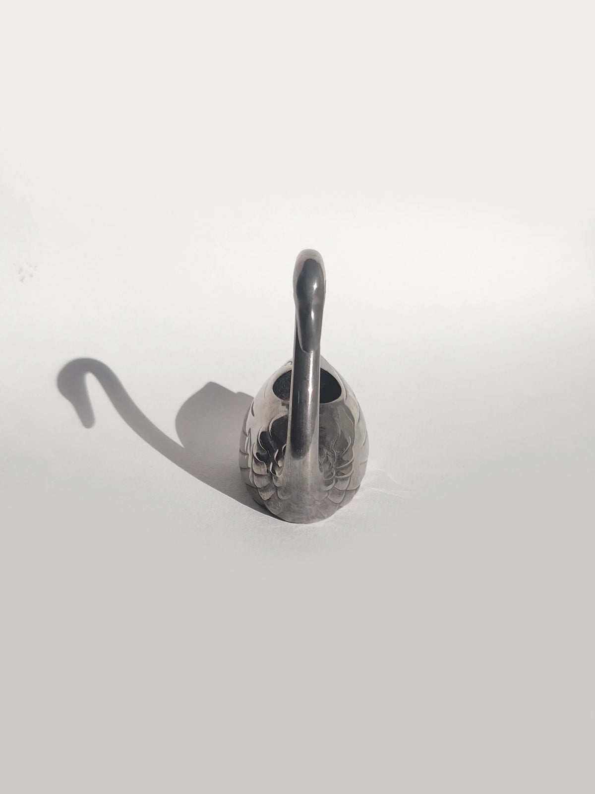 Swan Candle Holder — lifestyle setting