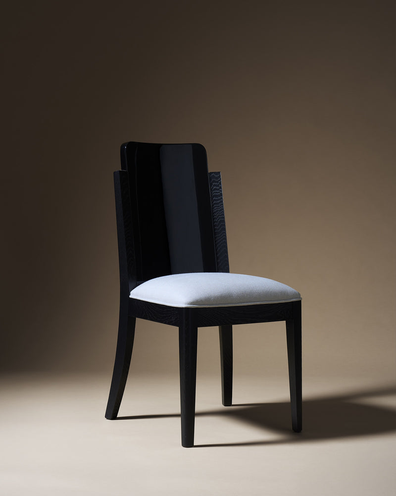Black lacquered Opera chair with white upholstered seat by Astrid Houssin