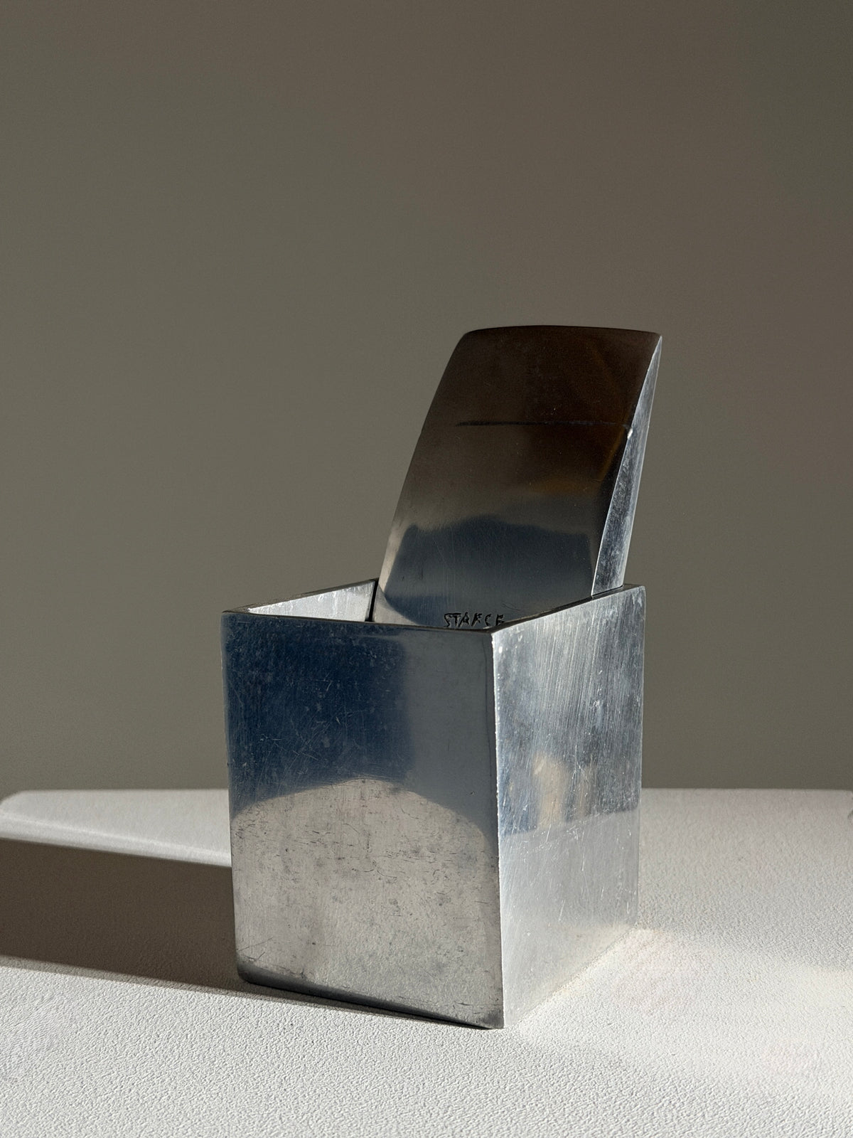 "Ray Hollis” ashtray designed by Philippe Starck in 1985 — lifestyle setting