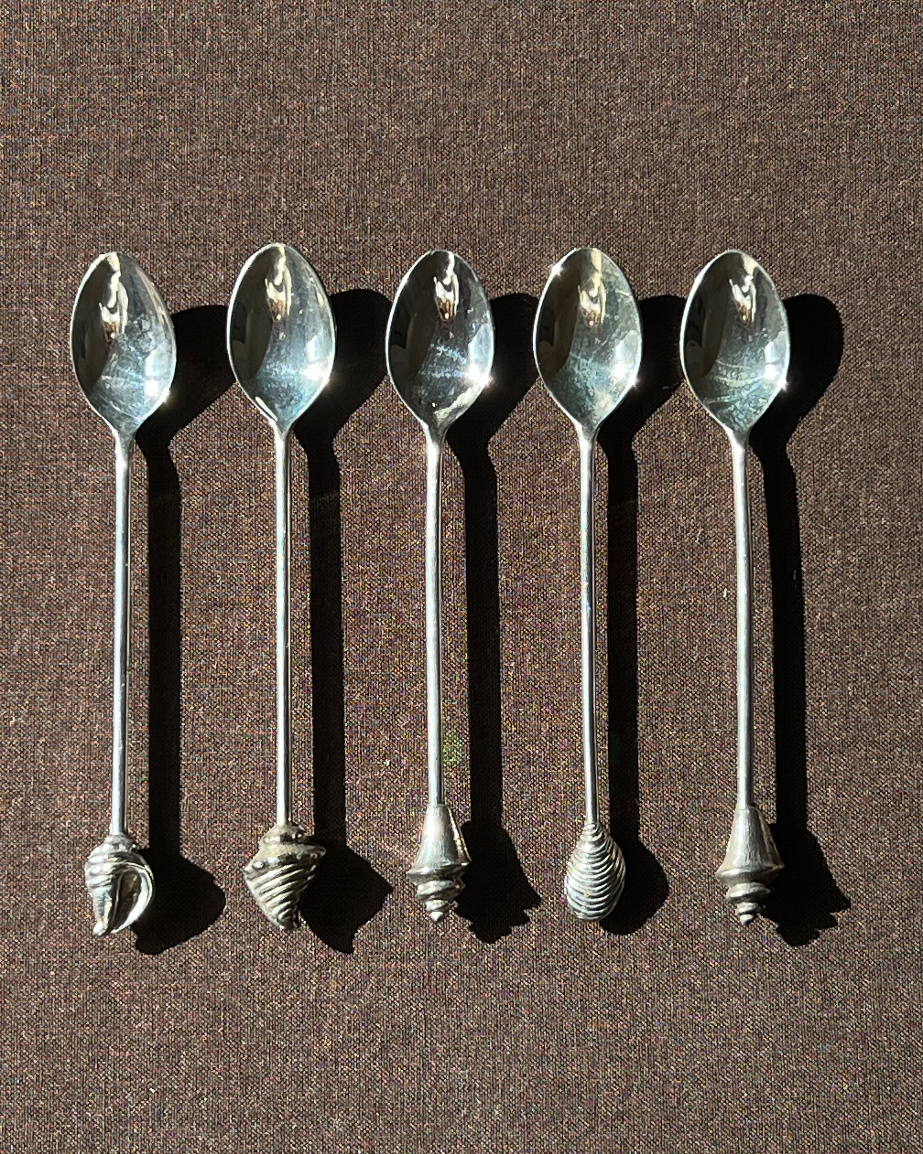 Silver Plated Shell Dessert Spoons — detail view