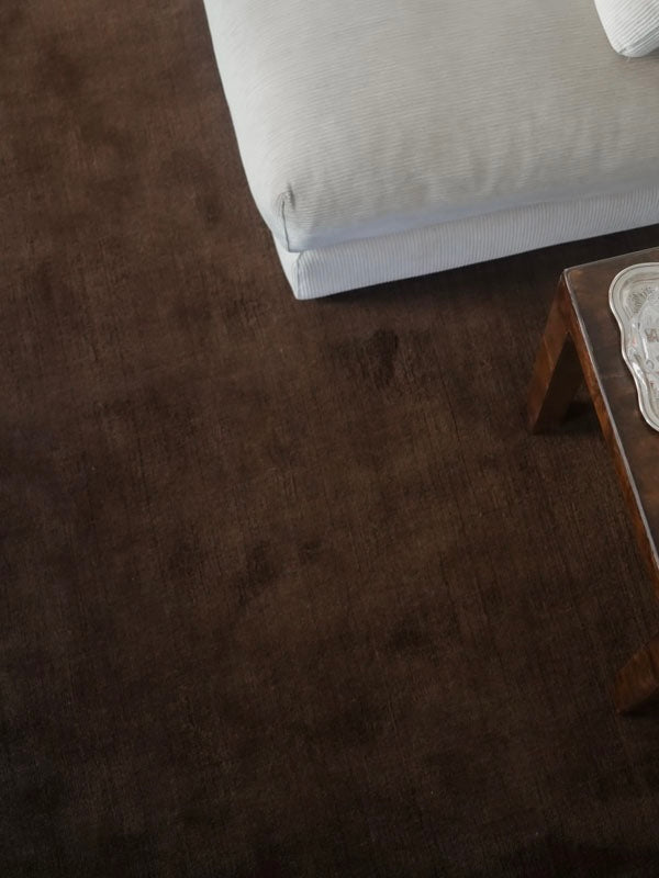 Hand-woven Rug in New Zealand Wool, Cacao Brown — side angle