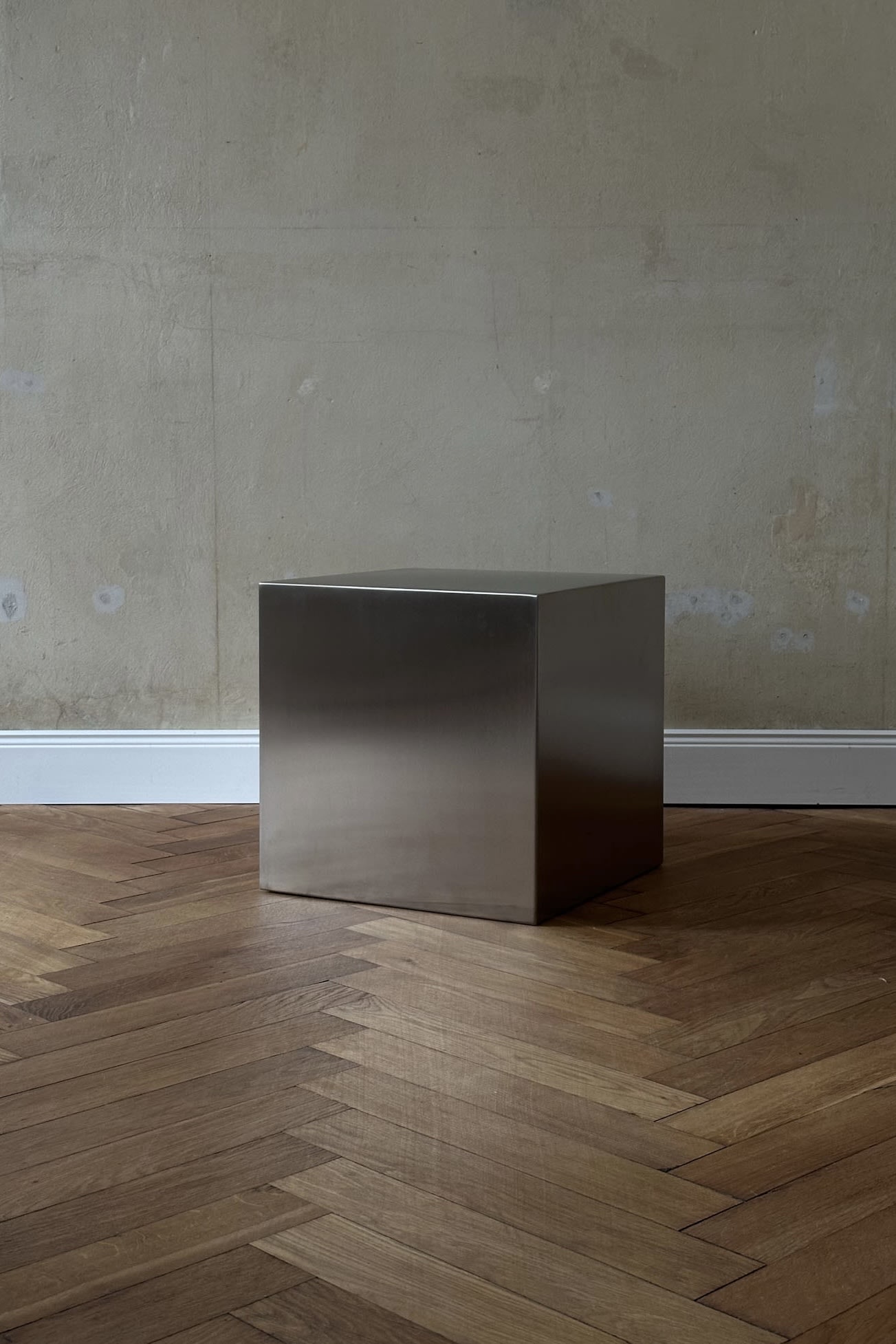 'NOSTALGIA' stainless steel cube — side angle