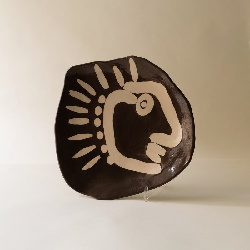 Modernist ceramic plate with stylized bird motif, 1950s