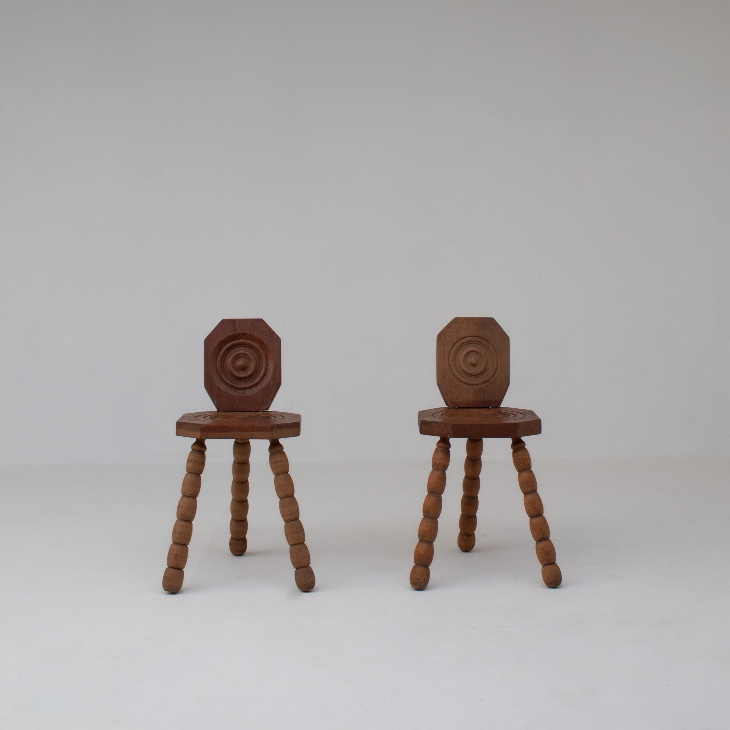 Pair of Sculptural Bobbin Stools with Backrests — side angle