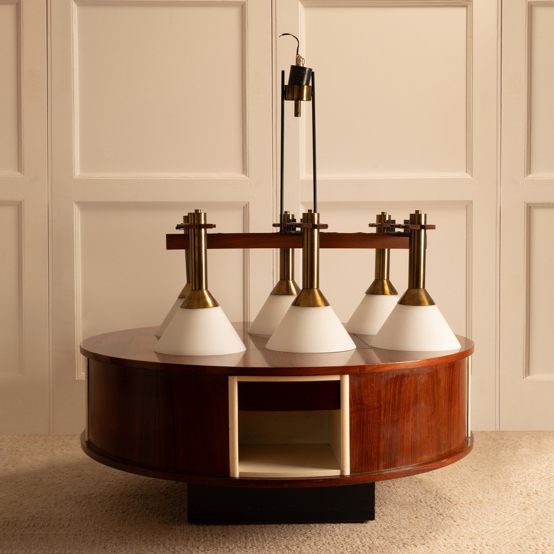 Six-light pendant lamp — front view on round wooden table