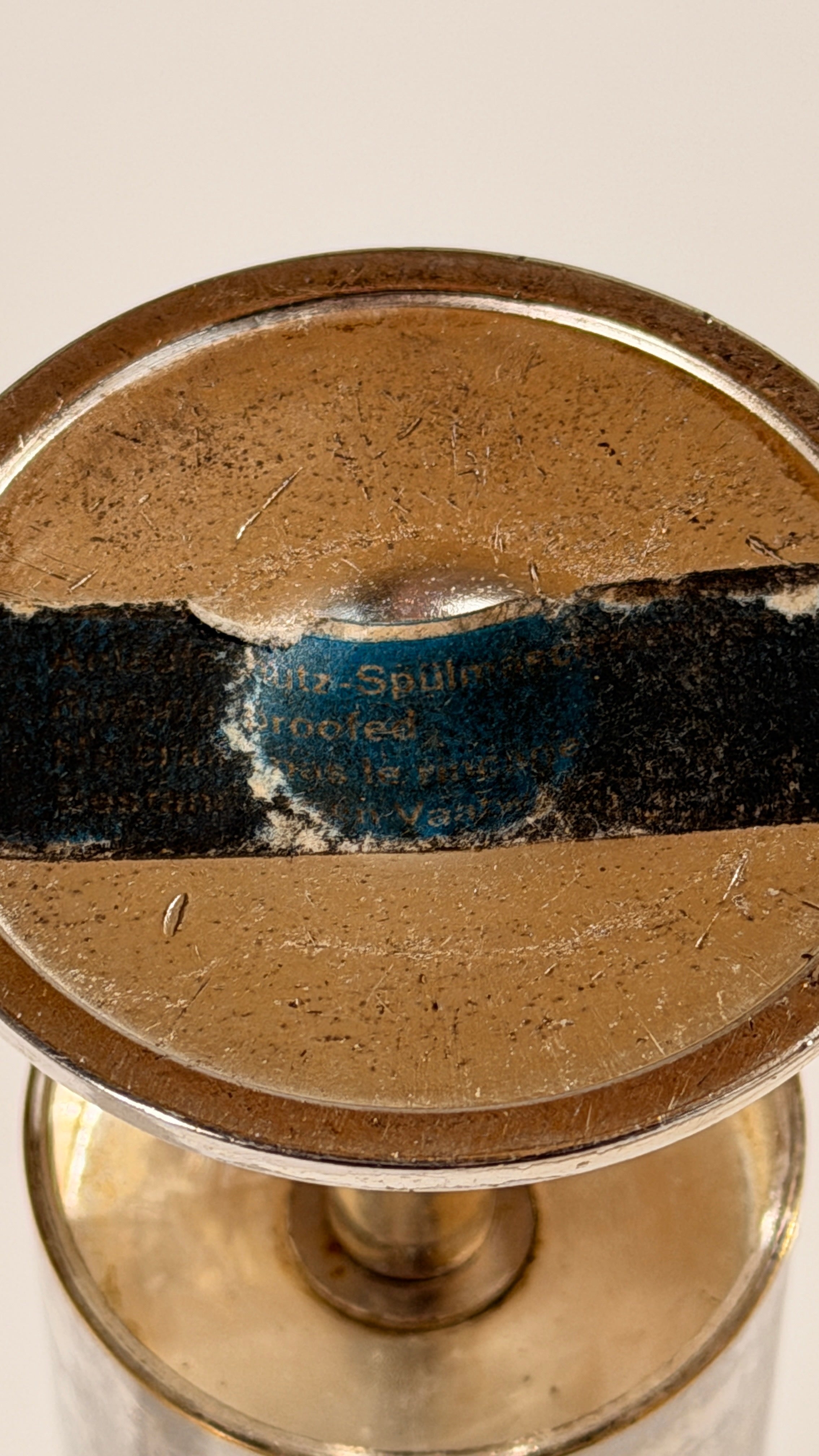 Large Silver-plated Metal Candleholder, France, circa 1970. — underside view showing label and wear