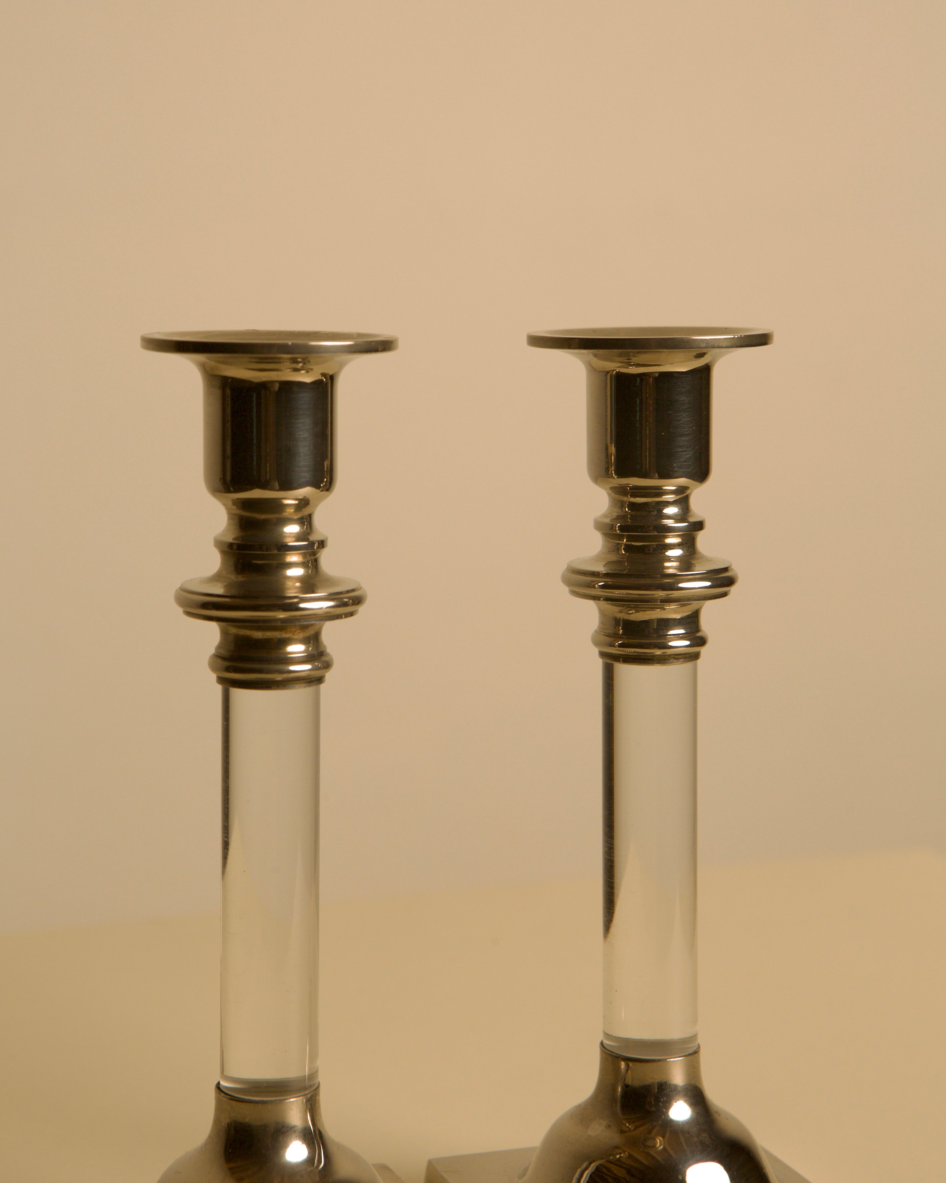 Pair of Italian Candleholders in Lucite and Silver-plated Metal, 1980s — close-up view highlighting clear Lucite and silver d