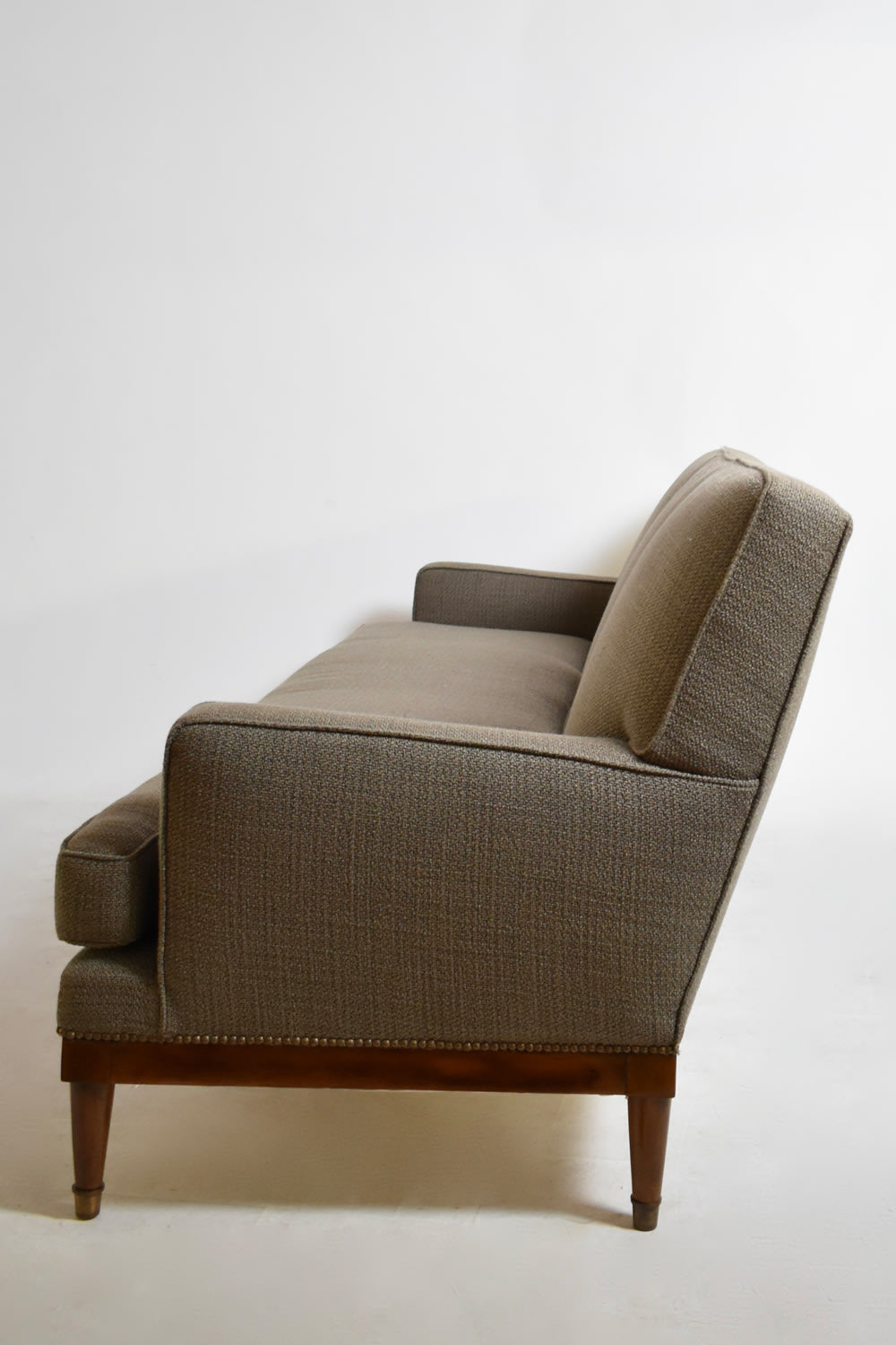Three Seats Sofa, 1960s — side profile showing textured fabric and wooden legs