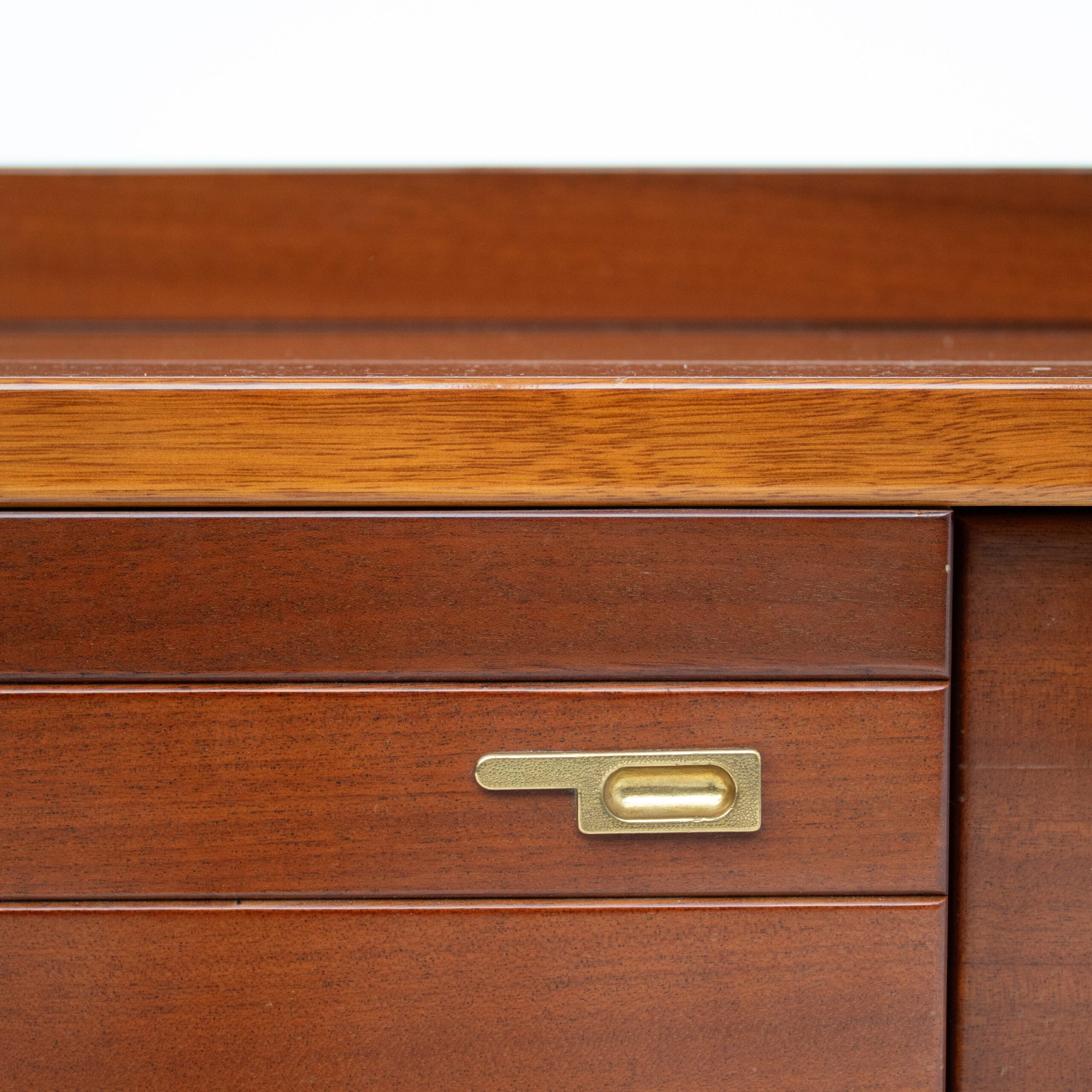Set of Nightstands in Wood and Brass — close-up of wooden drawer with brass handle
