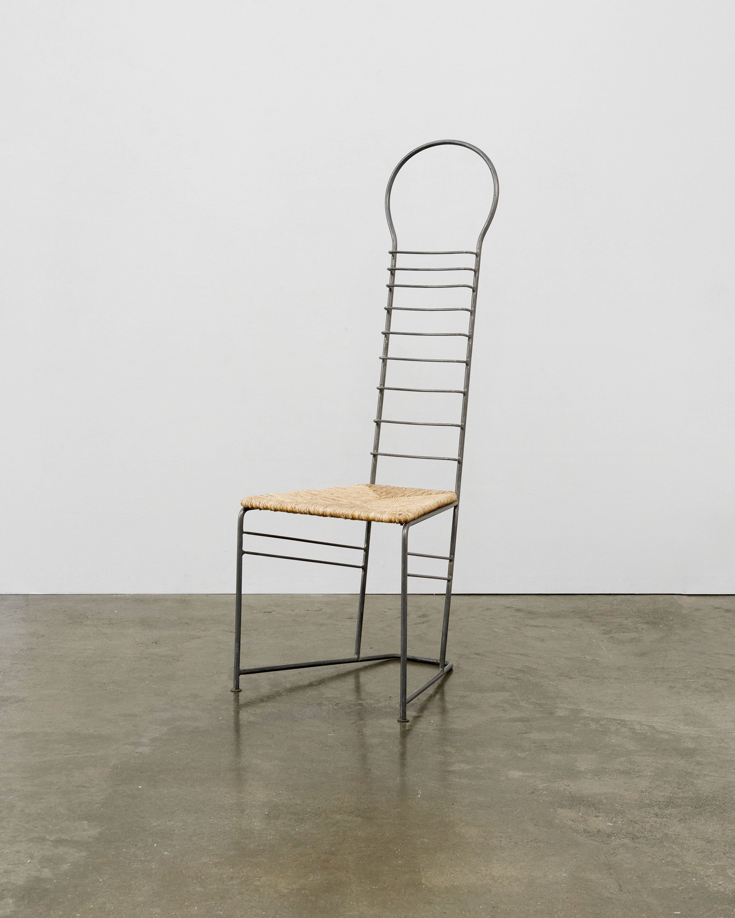 Vintage Sculptural Steel and Straw Chair