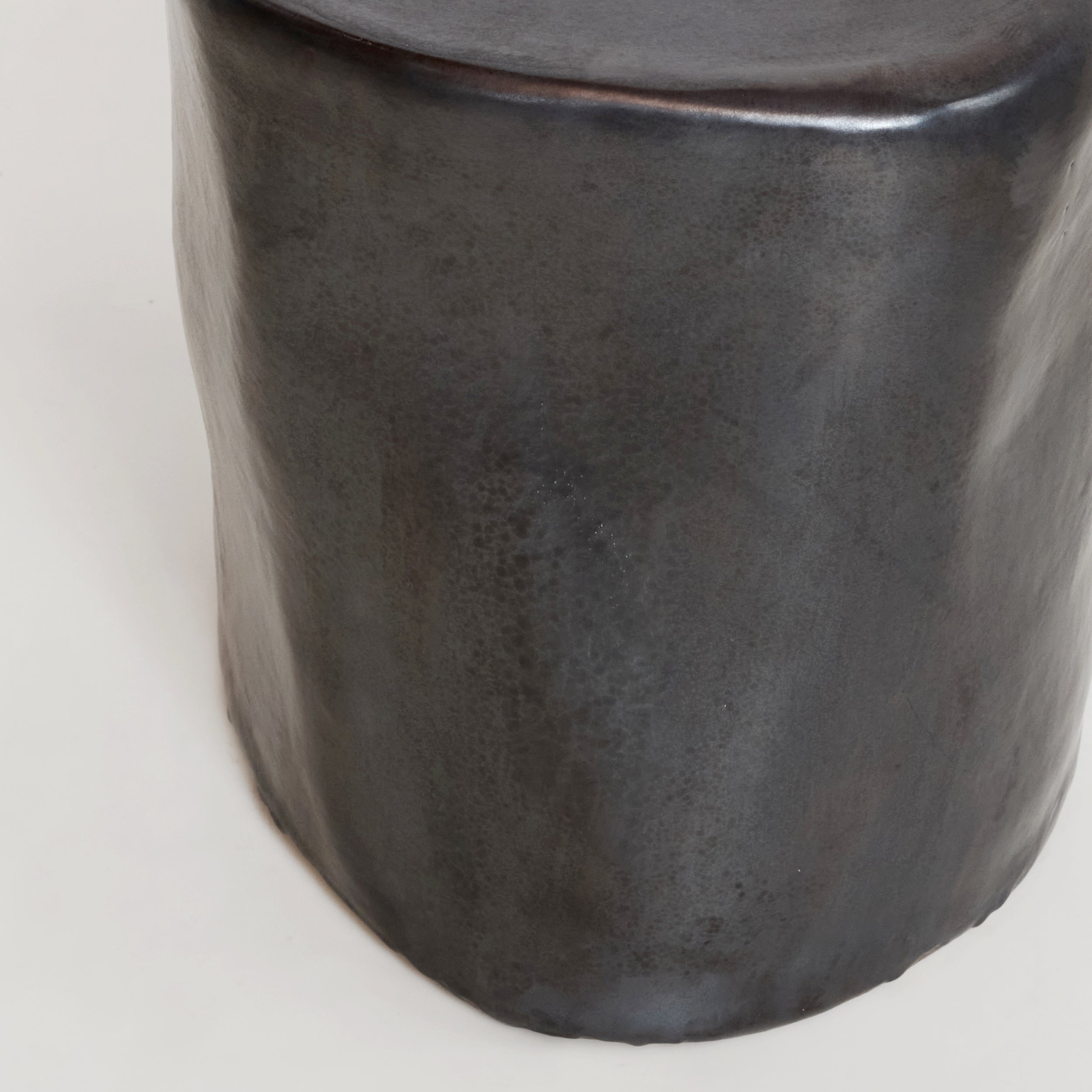Ceramic Side Table (small) — close-up of dark ceramic surface