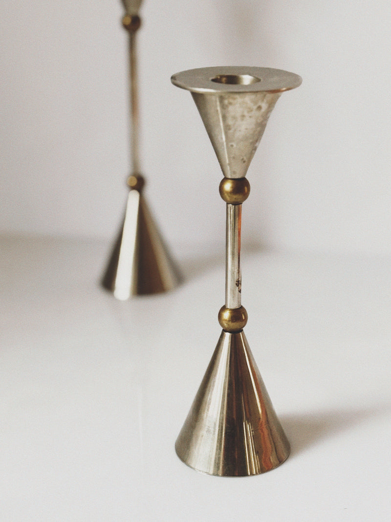 Postmodern Metal and Brass Candleholders — close-up of metallic cone shape
