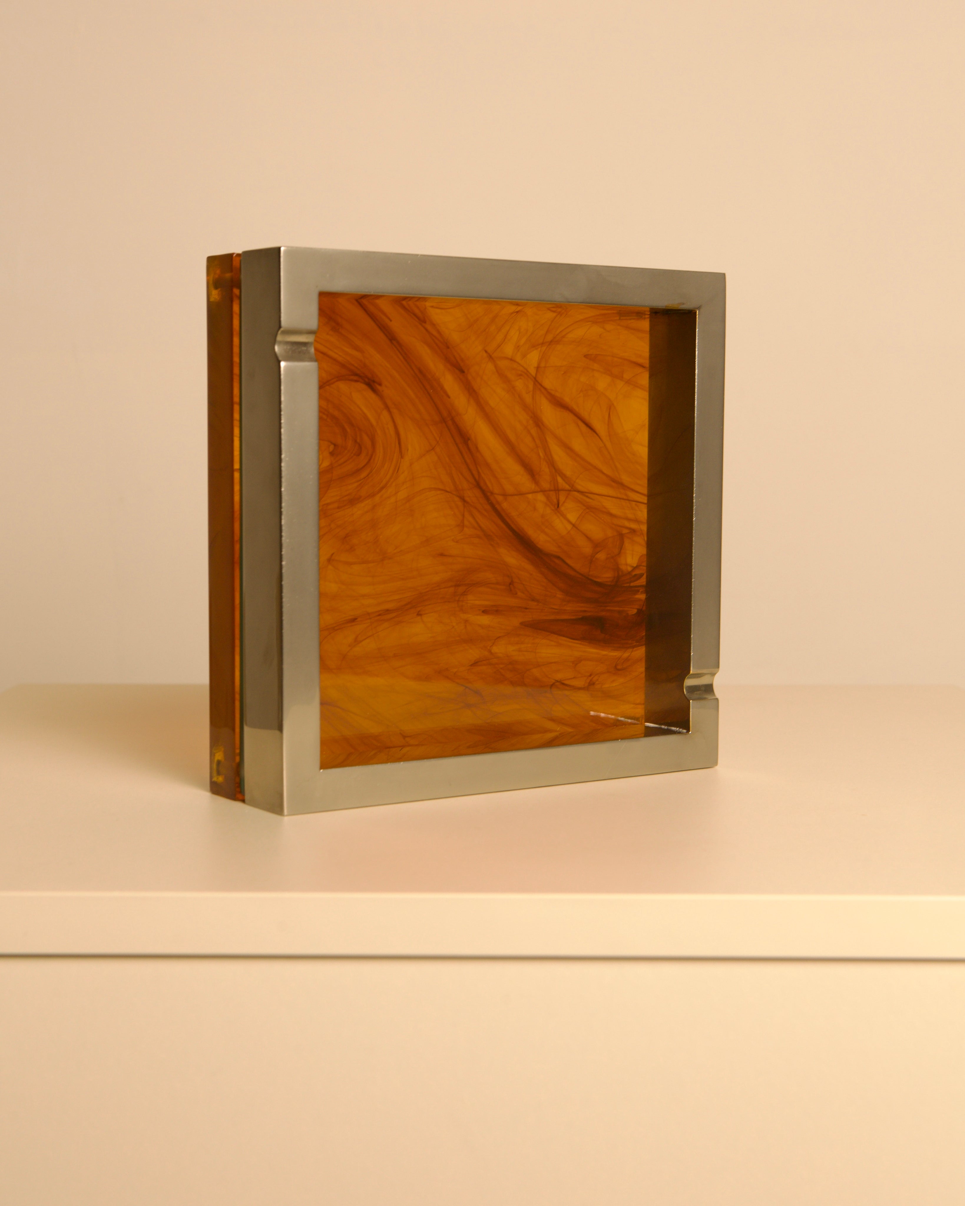 Large 70s Italian square ashtray in metal, glass and light smoked Plexiglas — detail view