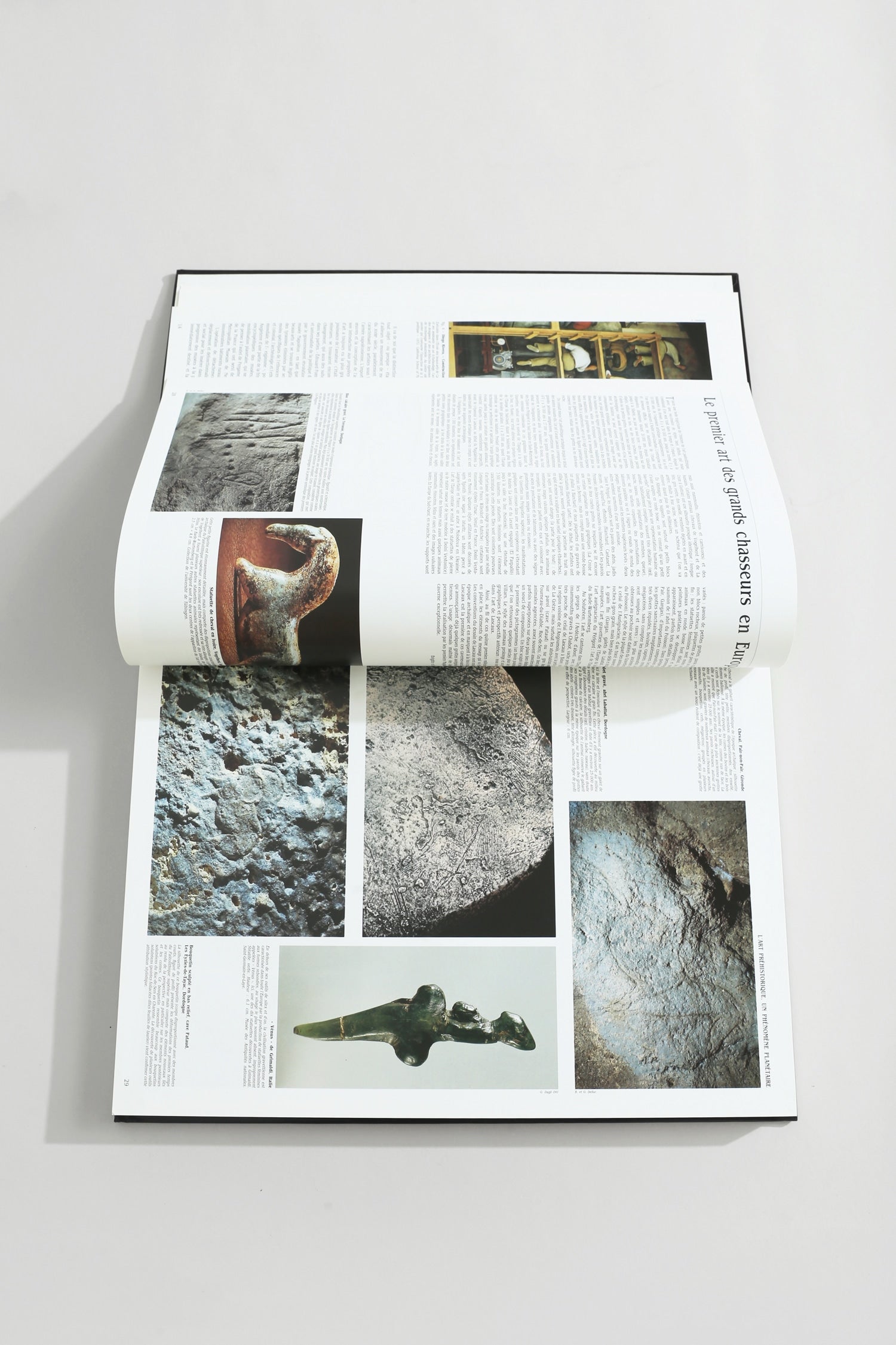 Le Grand Atlas de L’art Book Set — top view of open pages with textured images