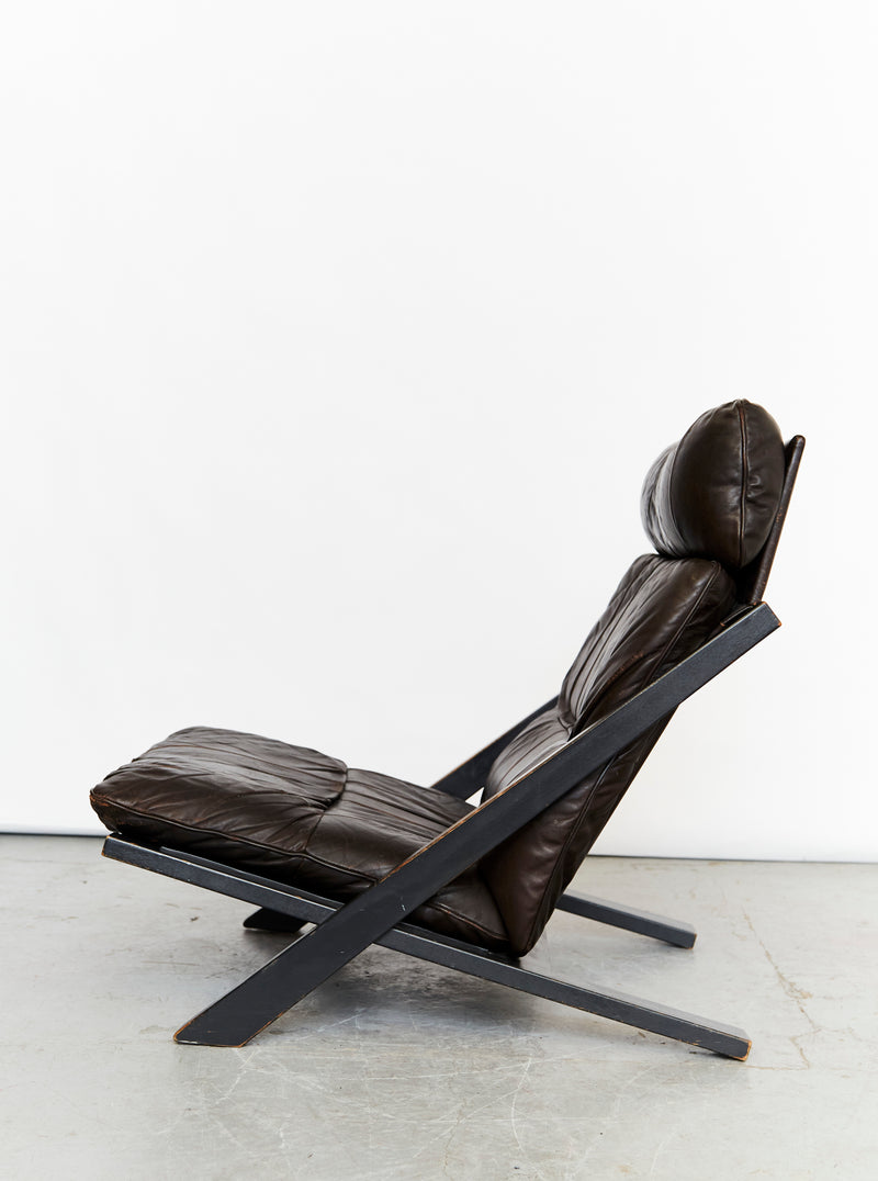 DS80 brown leather lounge chair profile view with crossed frame