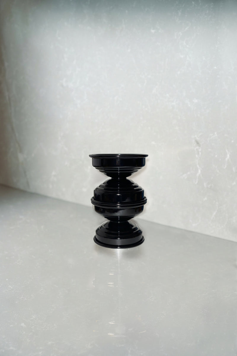 Contemporary Classic Candle Holders in Metal - Licorice Black Collection — close-up of glossy black finish on marble surface