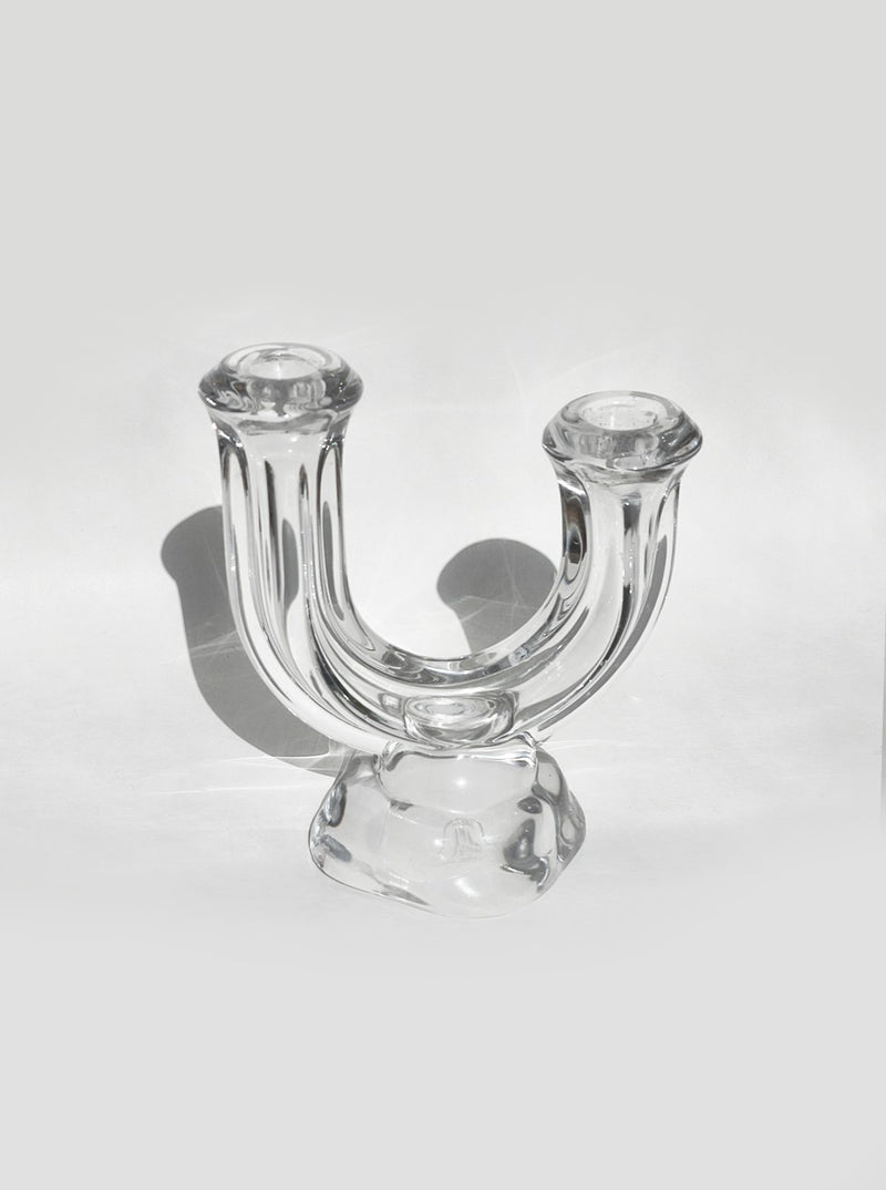 Clear glass arch-shaped candle holder with two cylindrical holders