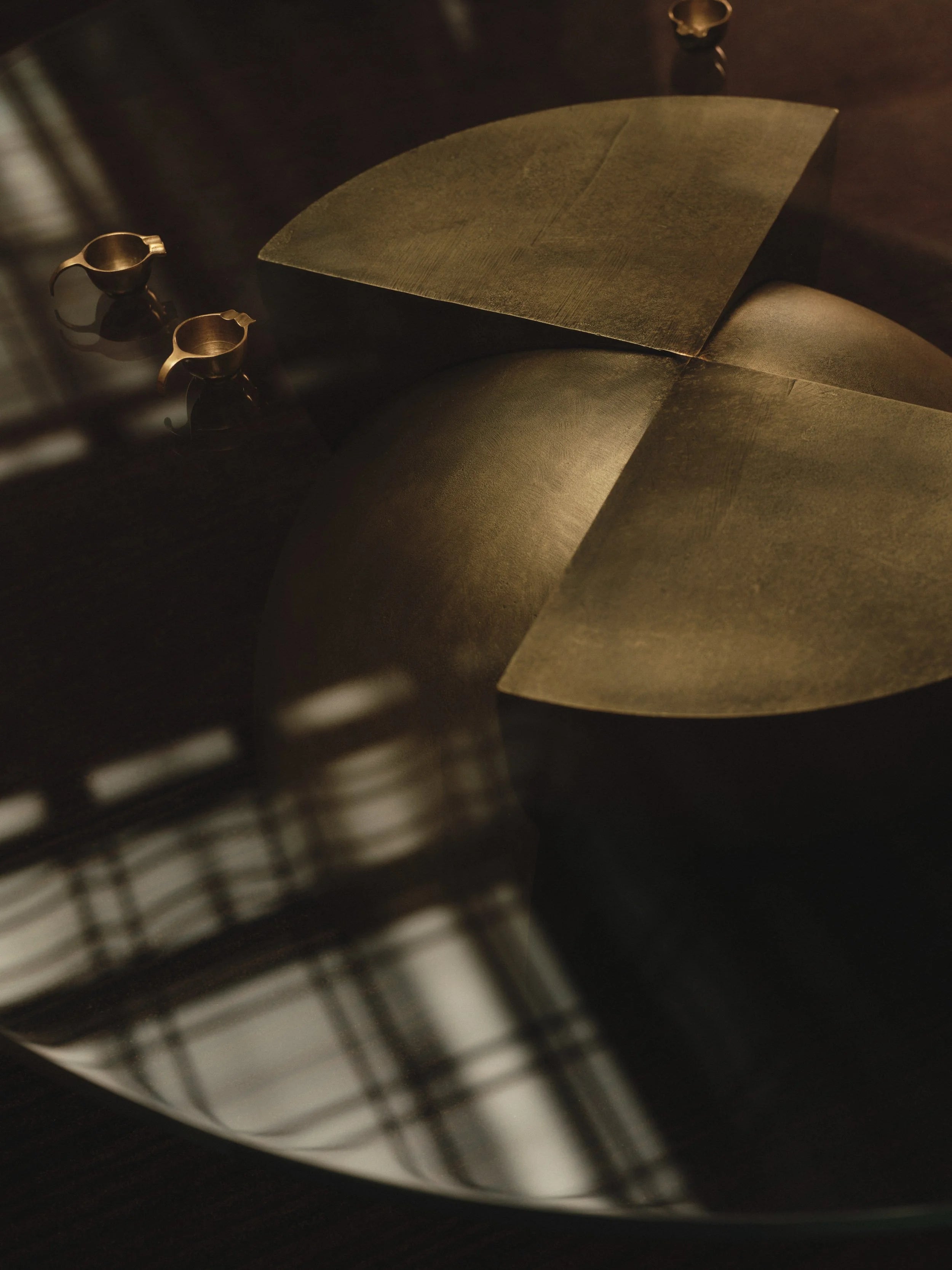 Axis Coffee Table in Glass and Cast Brass by Studio Brocky — side angle